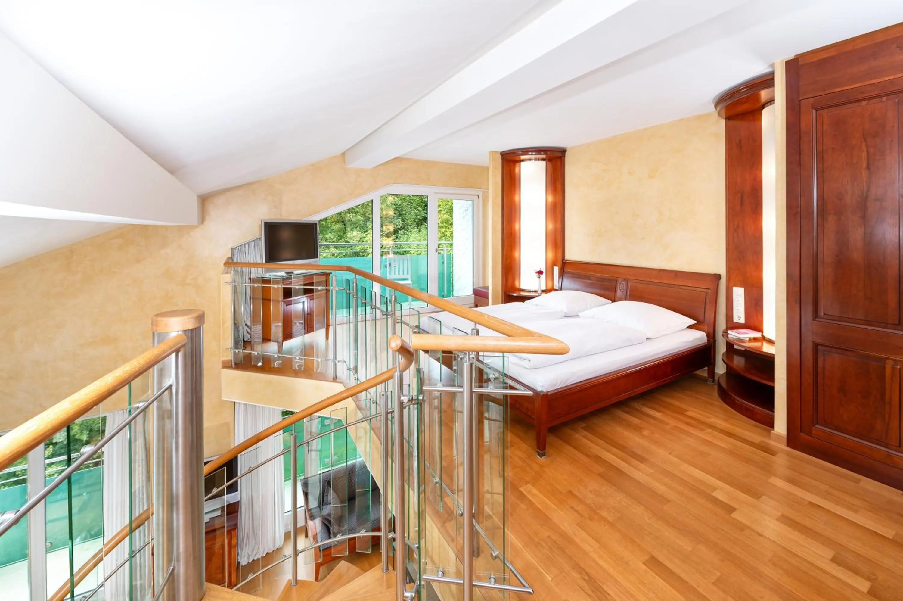 Photo of the whole room, Bed in AllgäuStern Hotel