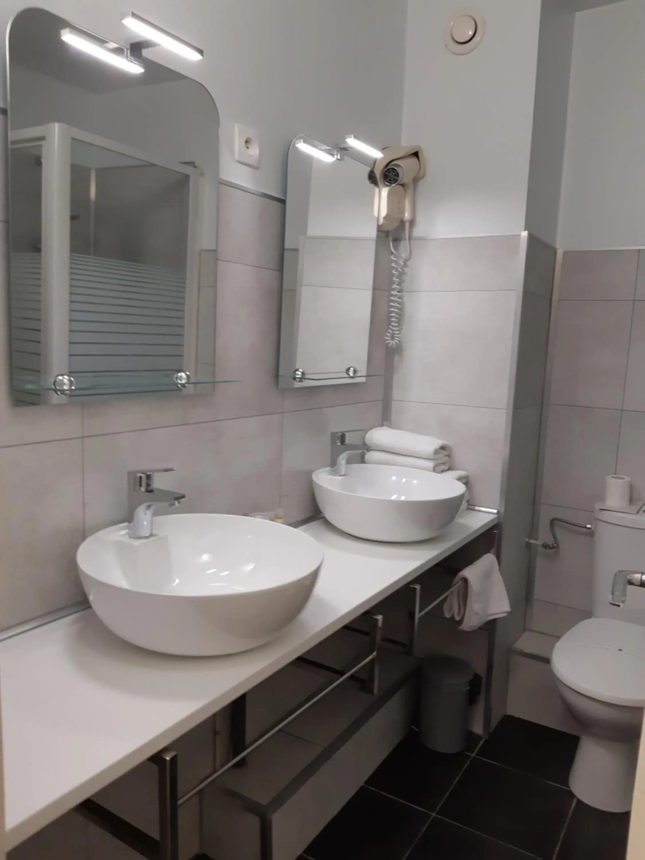 Toilet, Bathroom in Aerotel Versailles Saint Cyr - L'étape du Silence