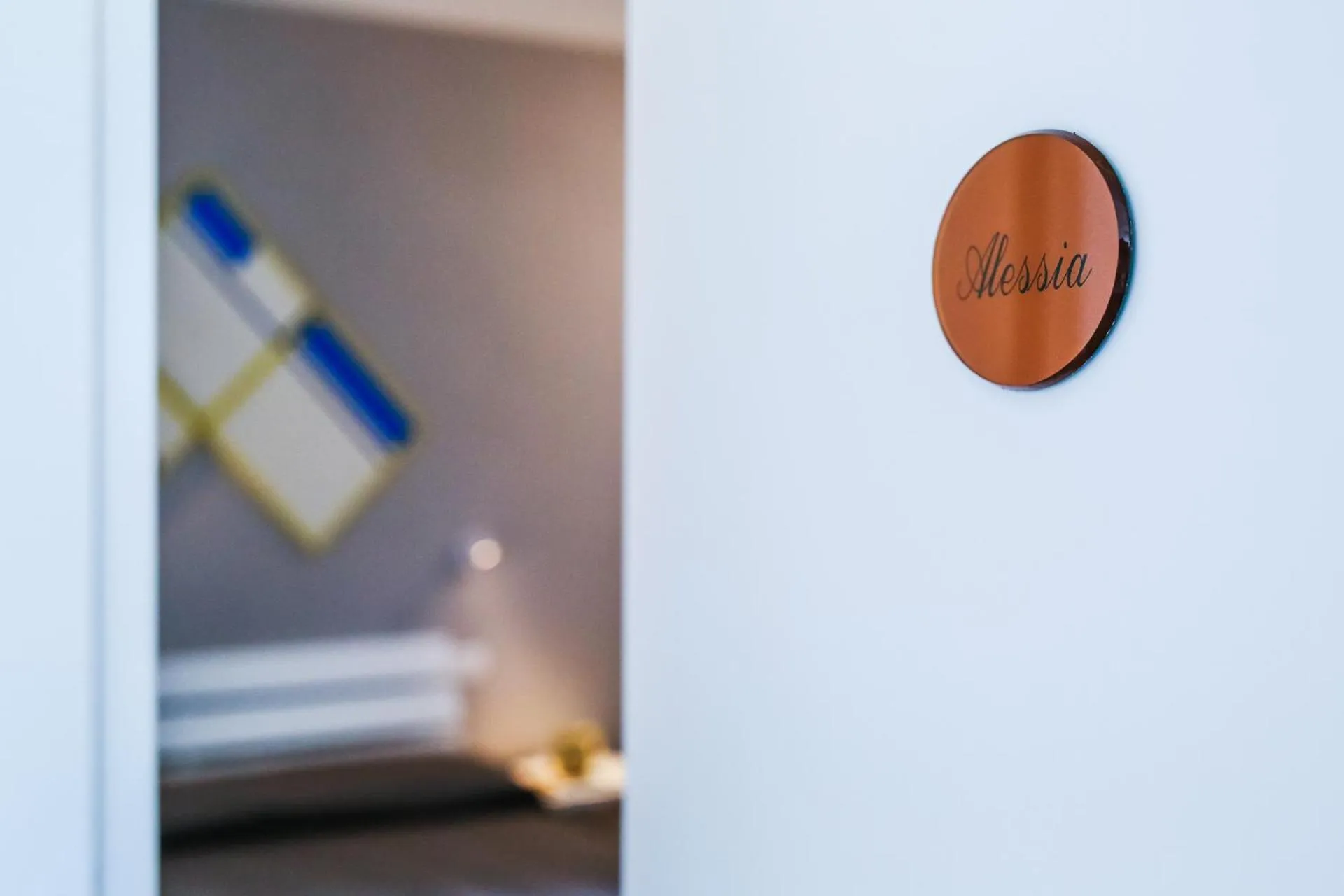 Decorative detail, Bed in B&B WarmUp Grosseto - Parcheggio incluso nella corte interna