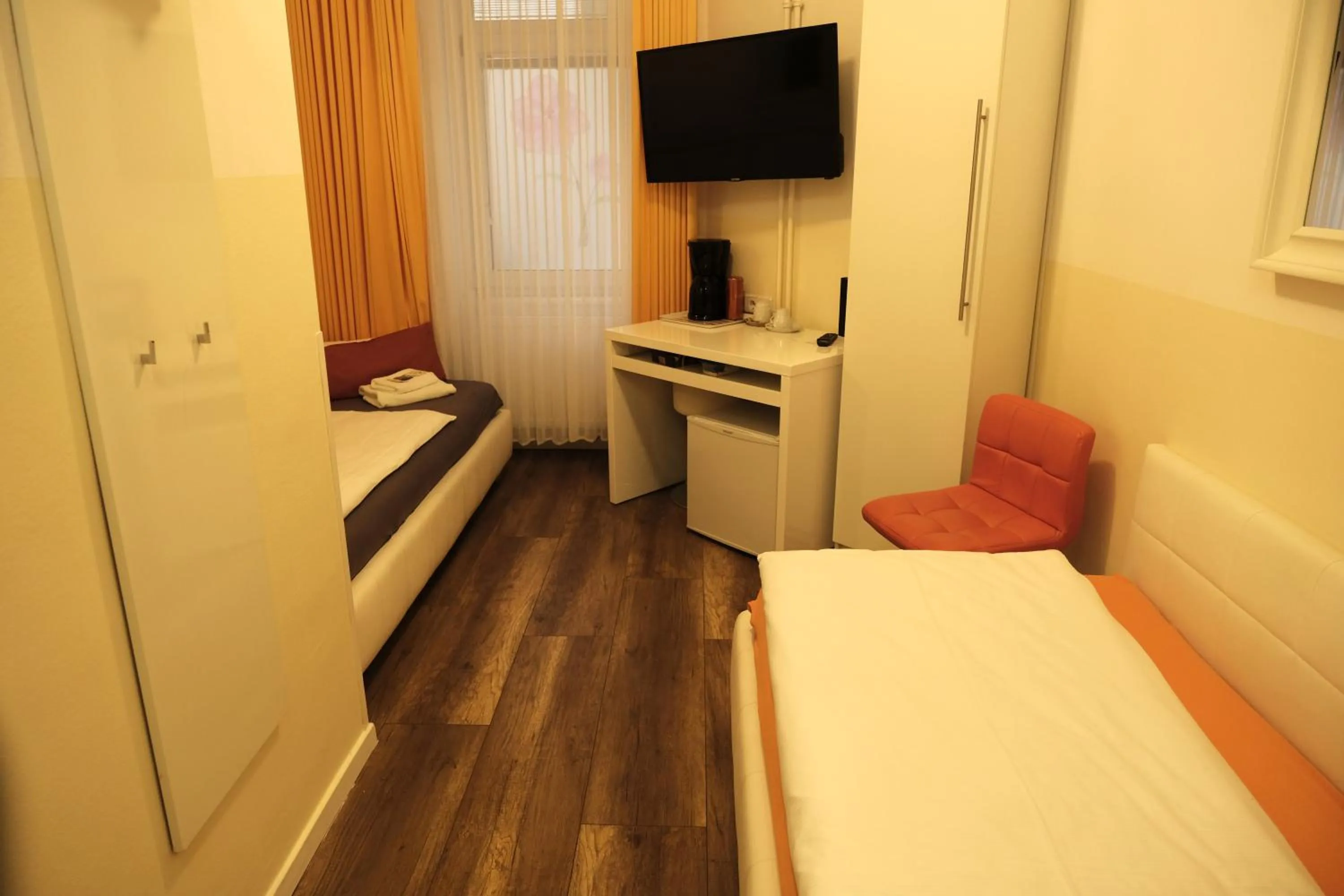 Bed in City Guesthouse Pension Berlin