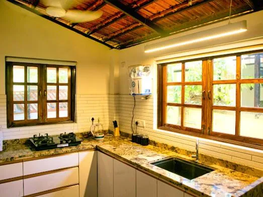 Kitchen or kitchenette in Lar Amorosa Boutique Hotel - Goa