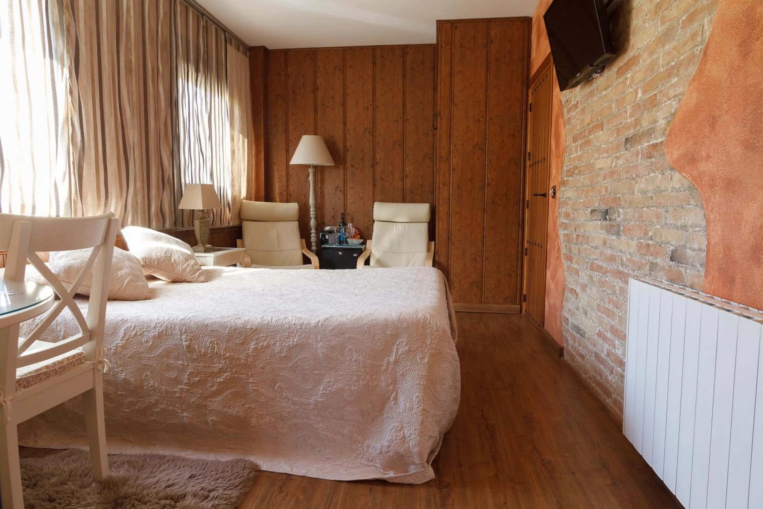 Bed in El Molí de Pontons suites con jacuzzi spa