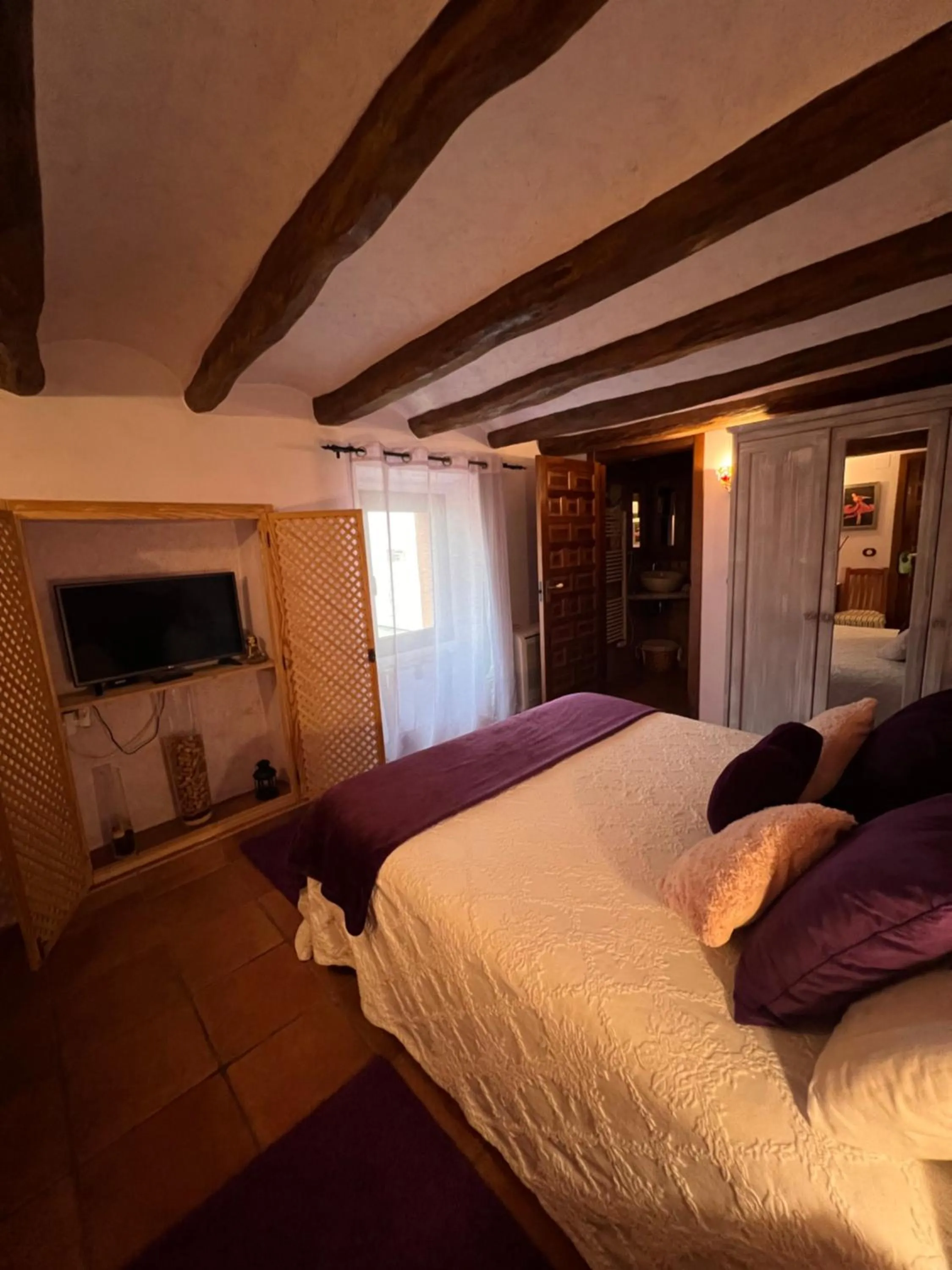 Bedroom, Bed in El Molí de Pontons suites con jacuzzi spa