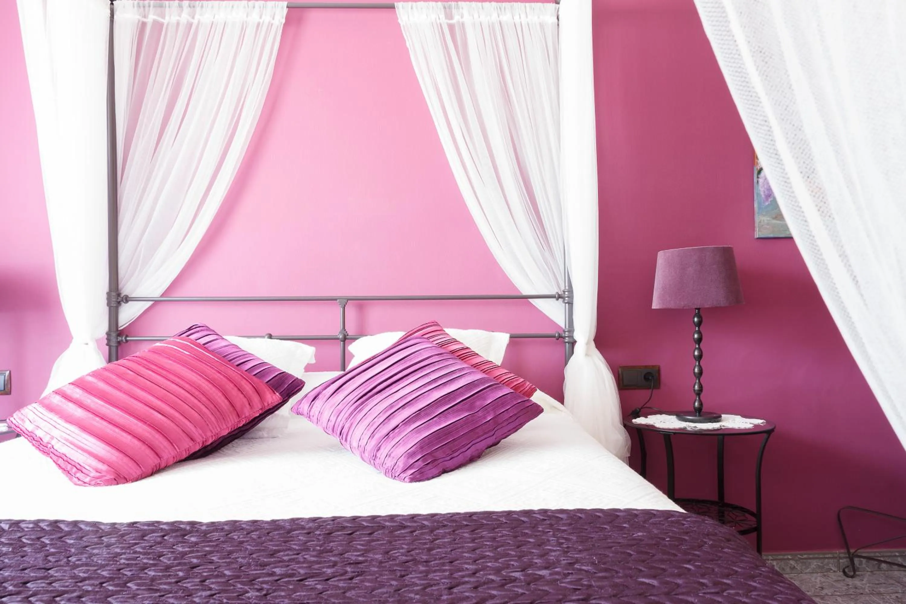 Bed in El Molí de Pontons suites con jacuzzi spa