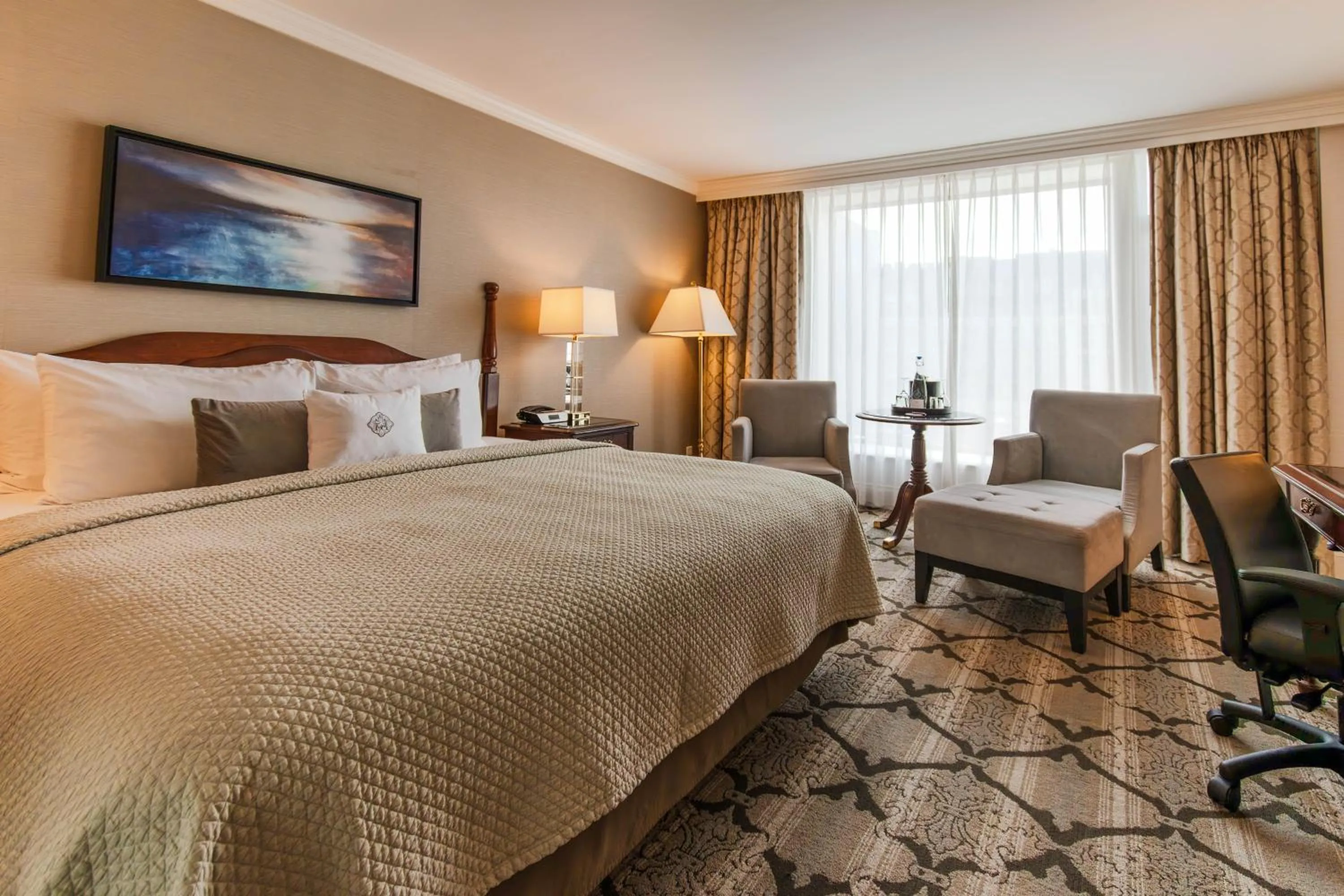 Bed in The Magnolia Hotel & Spa