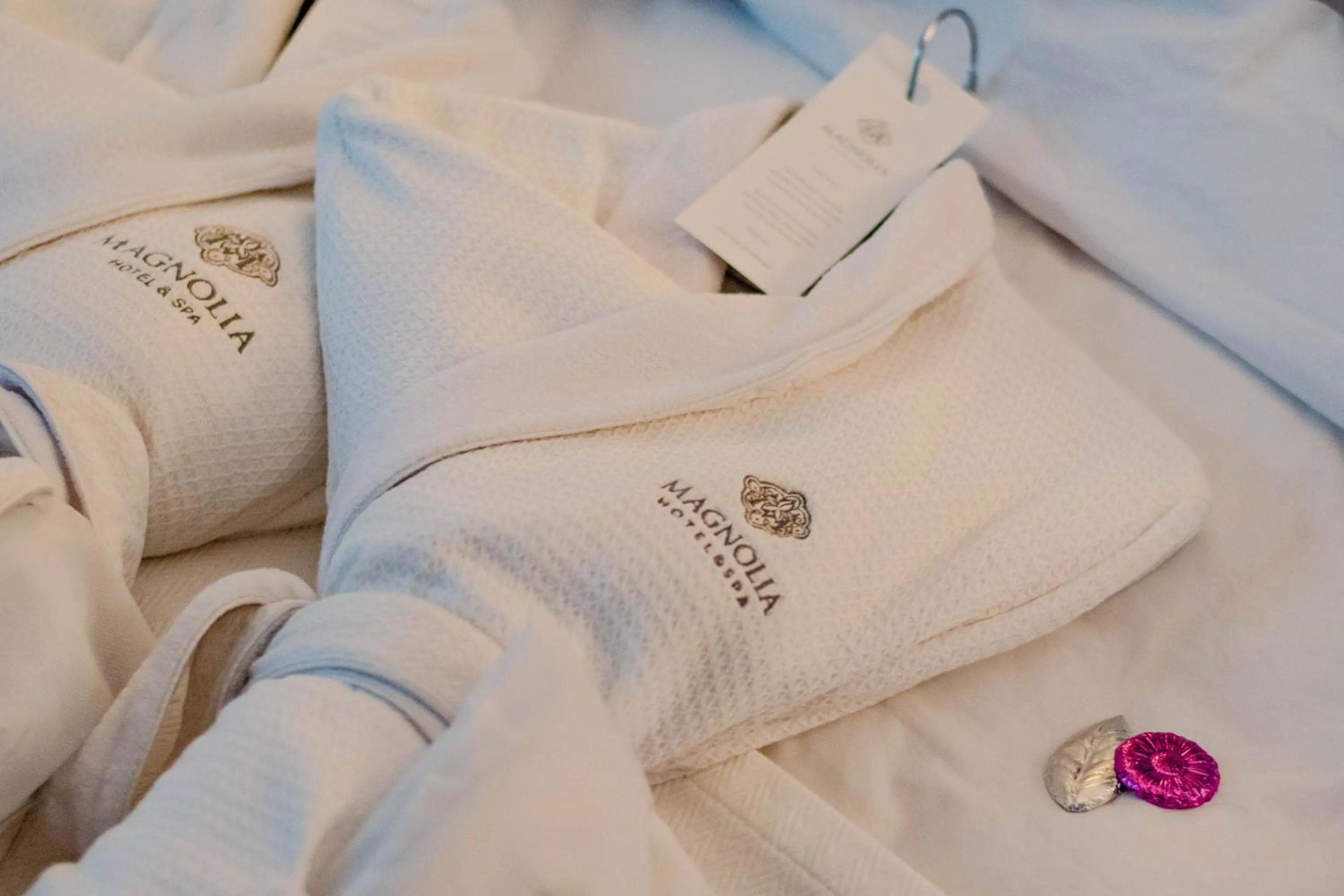 Bed in The Magnolia Hotel & Spa