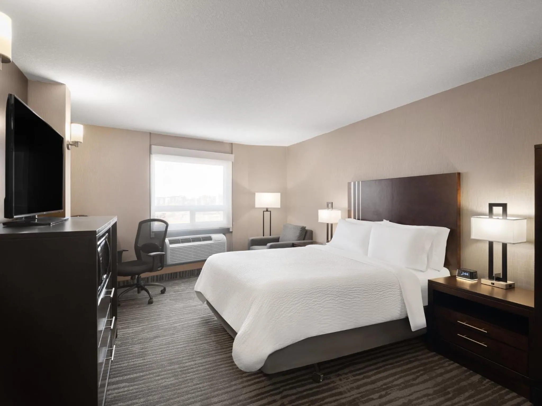 Photo of the whole room, Bed in Holiday Inn Calgary Airport by IHG