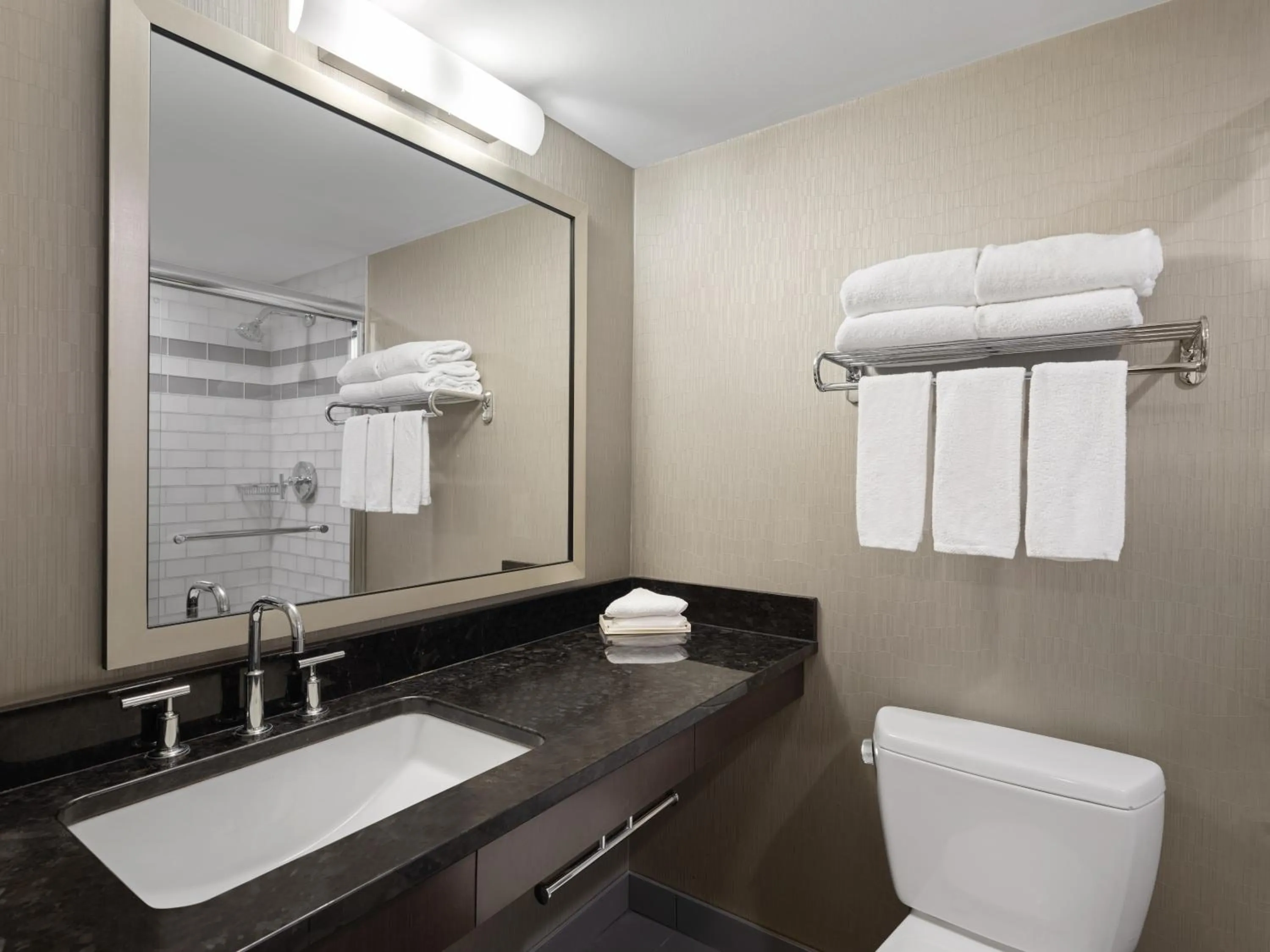 Bathroom in Holiday Inn Calgary Airport by IHG