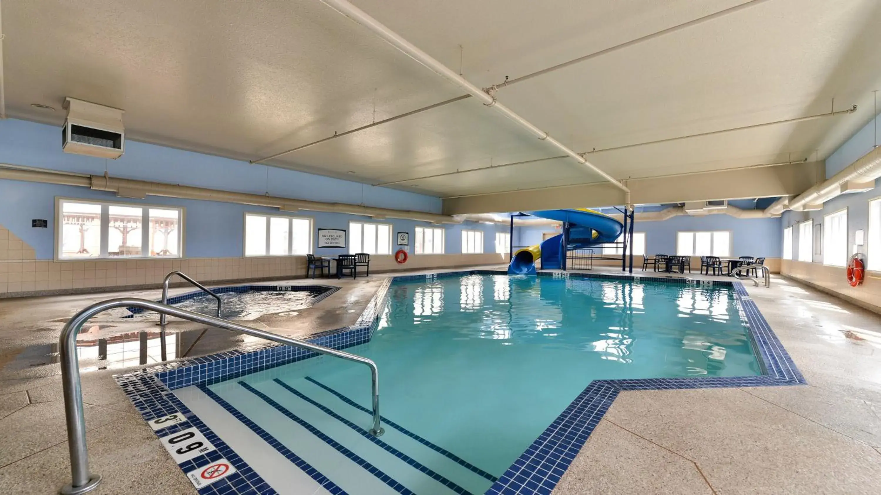 Swimming pool in Staybridge Suites - Calgary Airport by IHG Swimming pool in Staybridge Suites - Calgary Airport by IHG