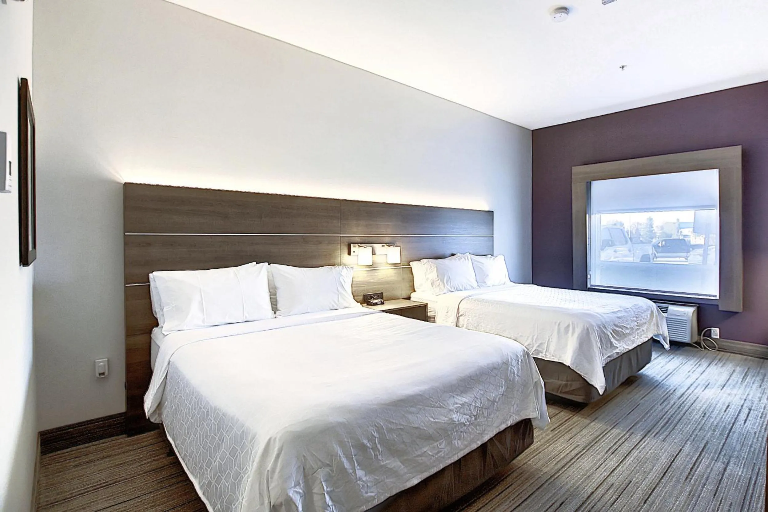 Bed in Holiday Inn Express Airport Calgary by IHG