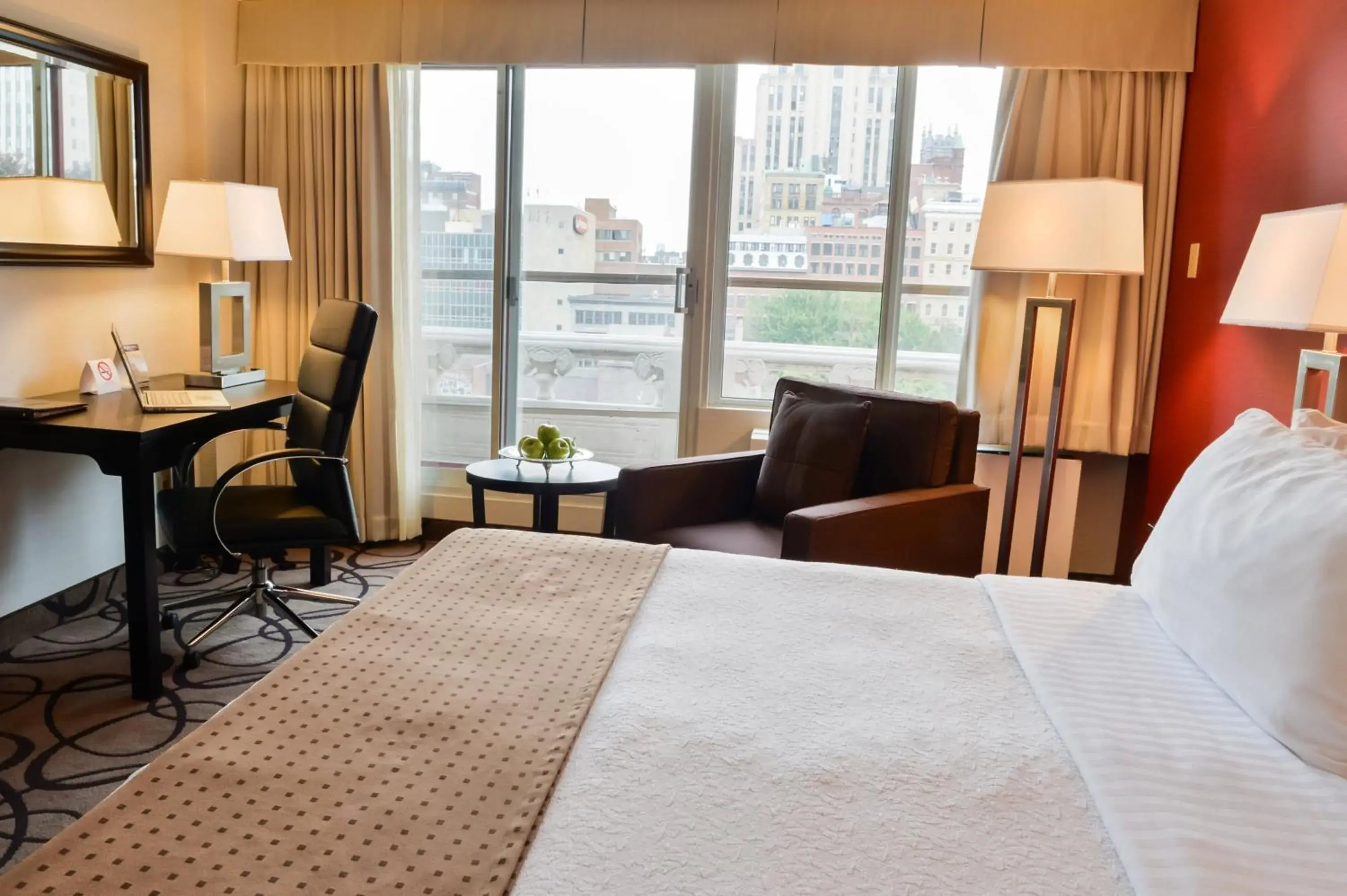Standard King Room with Balcony in Holiday Inn Montreal Centre Ville Downtown by IHG Standard King Room with Balcony in Holiday Inn Montreal Centre Ville Downtown by IHG