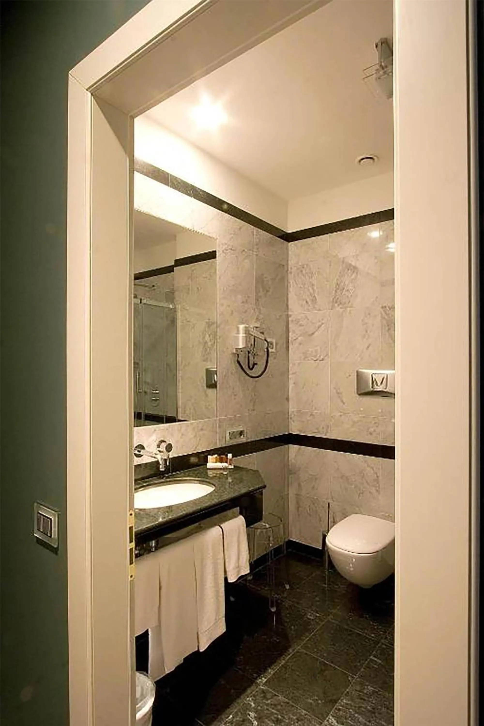 Bathroom in Grand Hotel della Posta, WorldHotels Distinctive