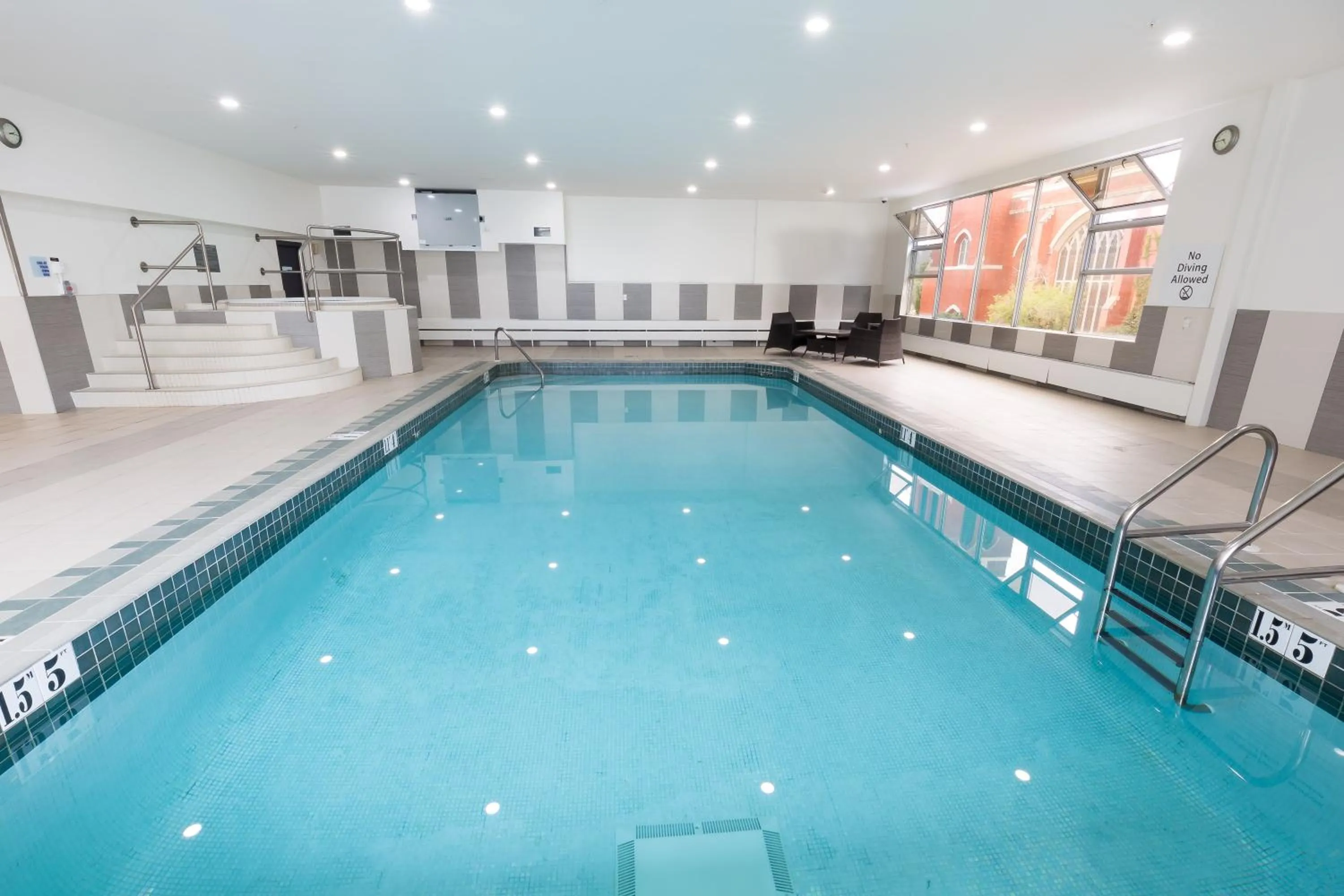 Swimming pool in Holiday Inn Express Edmonton Downtown by IHG