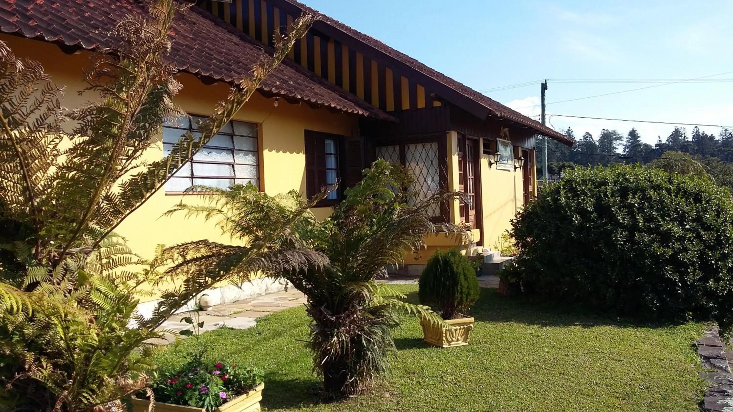Property building in Pousada Casa Amarela