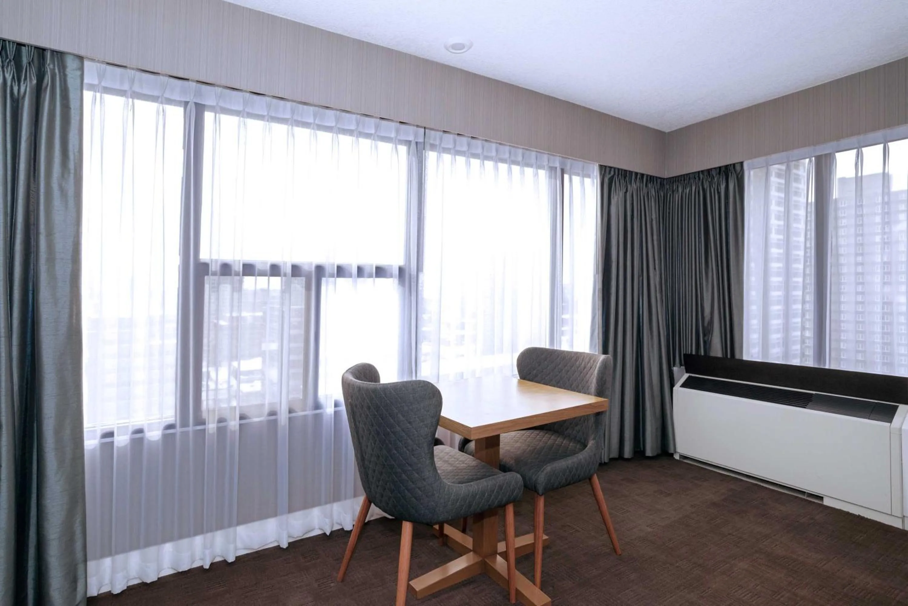 Photo of the whole room in Sandman Signature Calgary Downtown Hotel