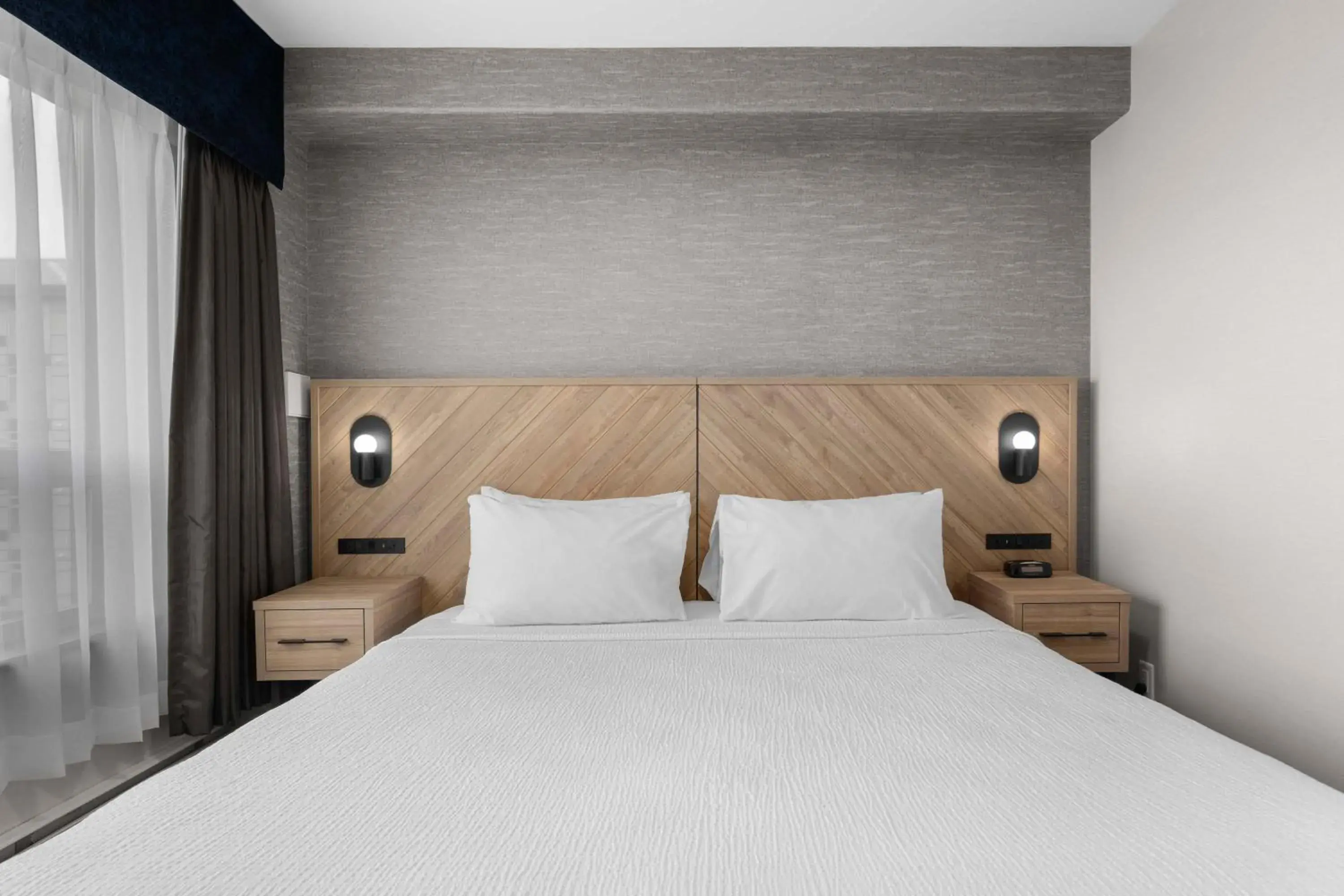 Photo of the whole room, Bed in Sandman Hotel Calgary Airport Photo of the whole room, Bed in Sandman Hotel Calgary Airport