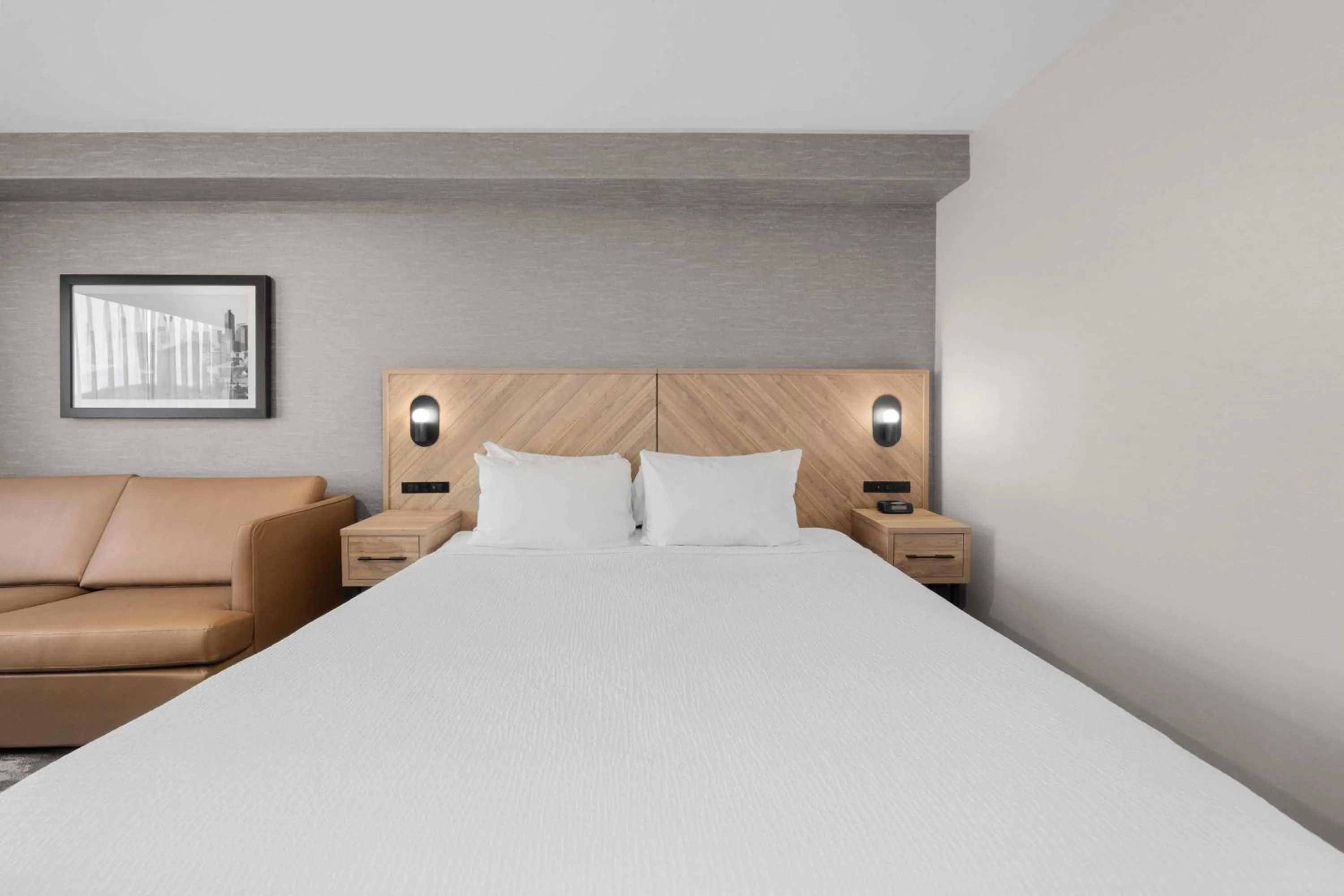 Photo of the whole room, Bed in Sandman Hotel Calgary Airport