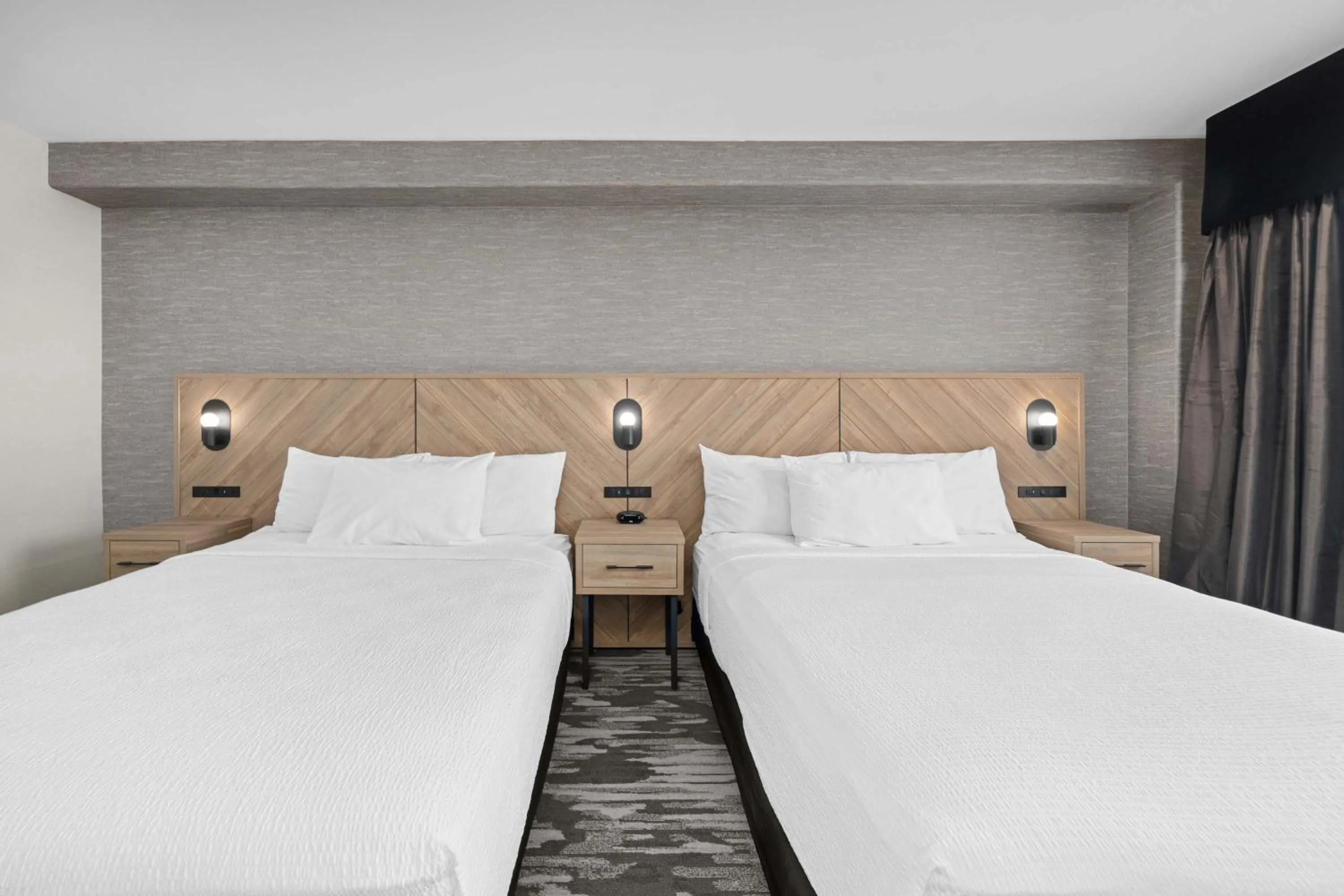 Photo of the whole room, Bed in Sandman Hotel Calgary Airport