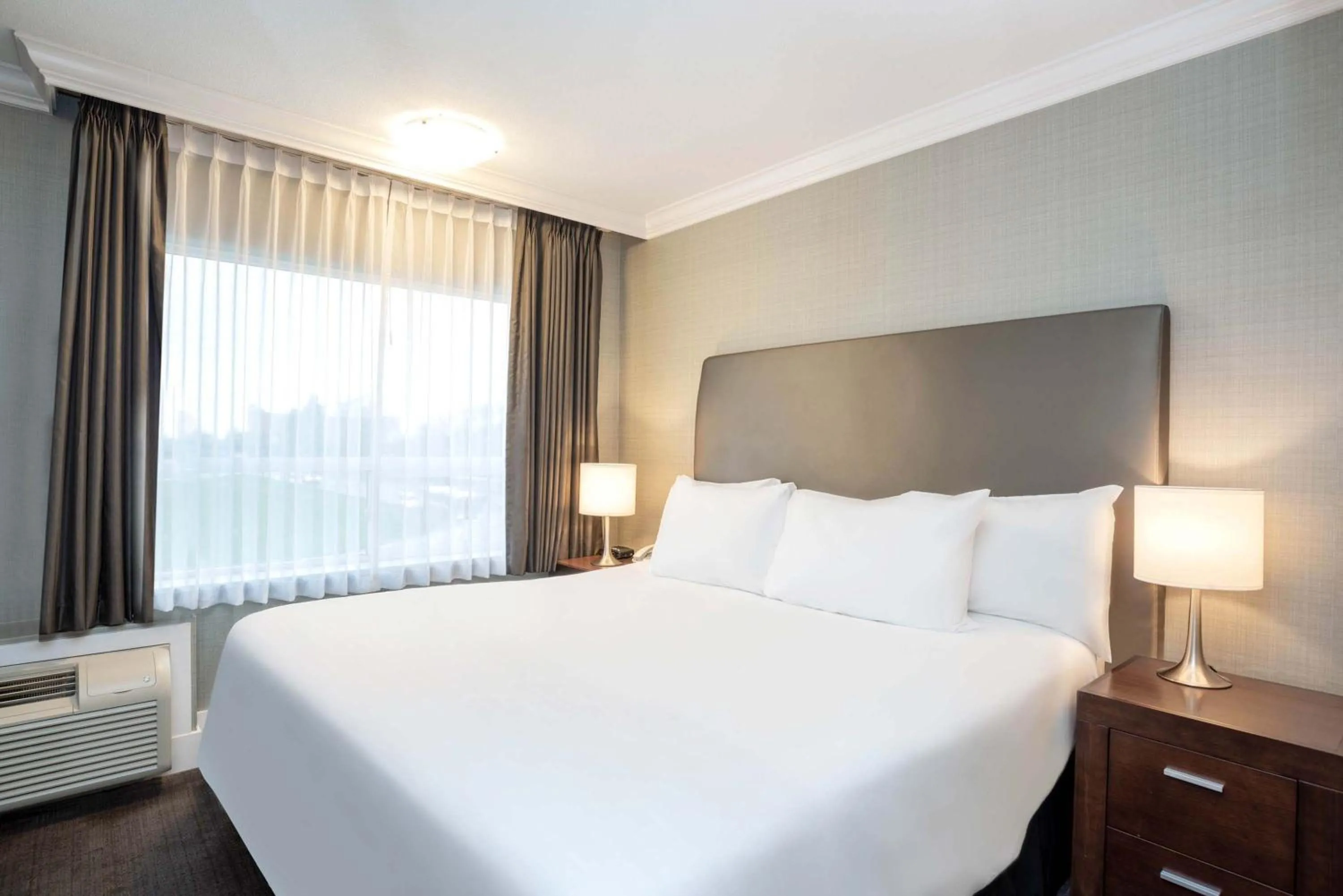 Photo of the whole room, Bed in Sandman Hotel Vancouver Airport