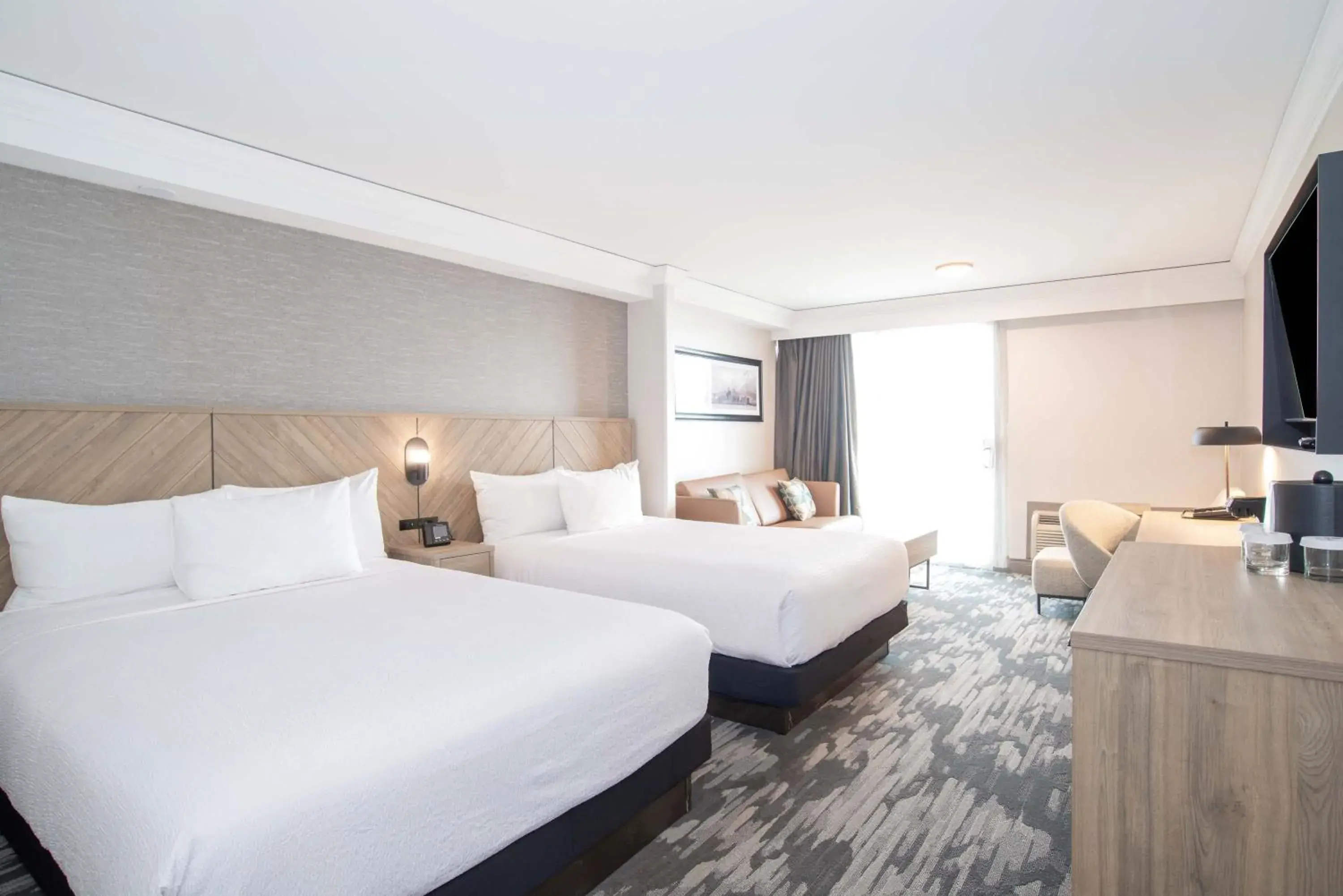 Photo of the whole room, Bed in Sandman Signature Toronto Airport Hotel Photo of the whole room, Bed in Sandman Signature Toronto Airport Hotel