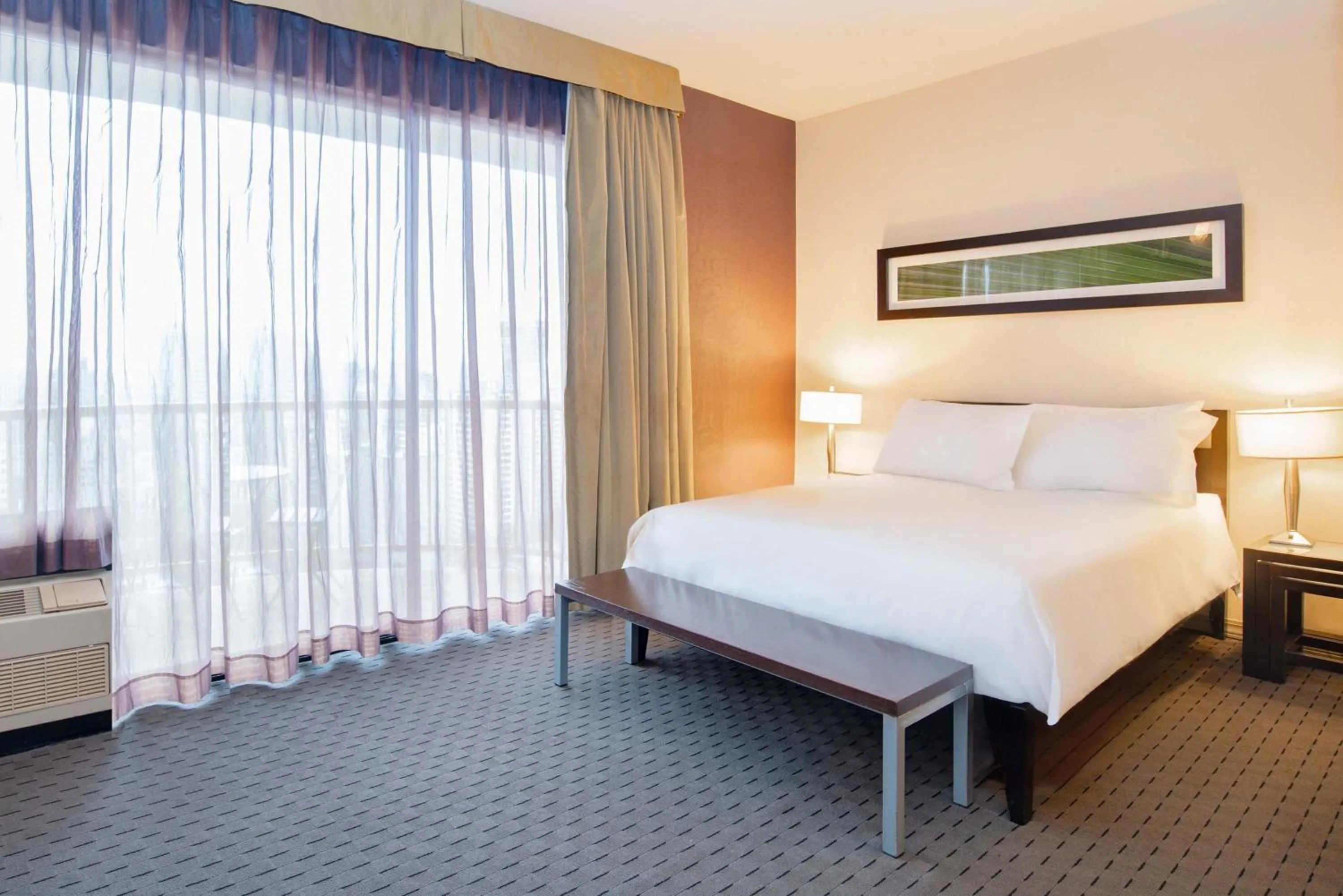 Photo of the whole room, Bed in Sandman Suites Vancouver on Davie