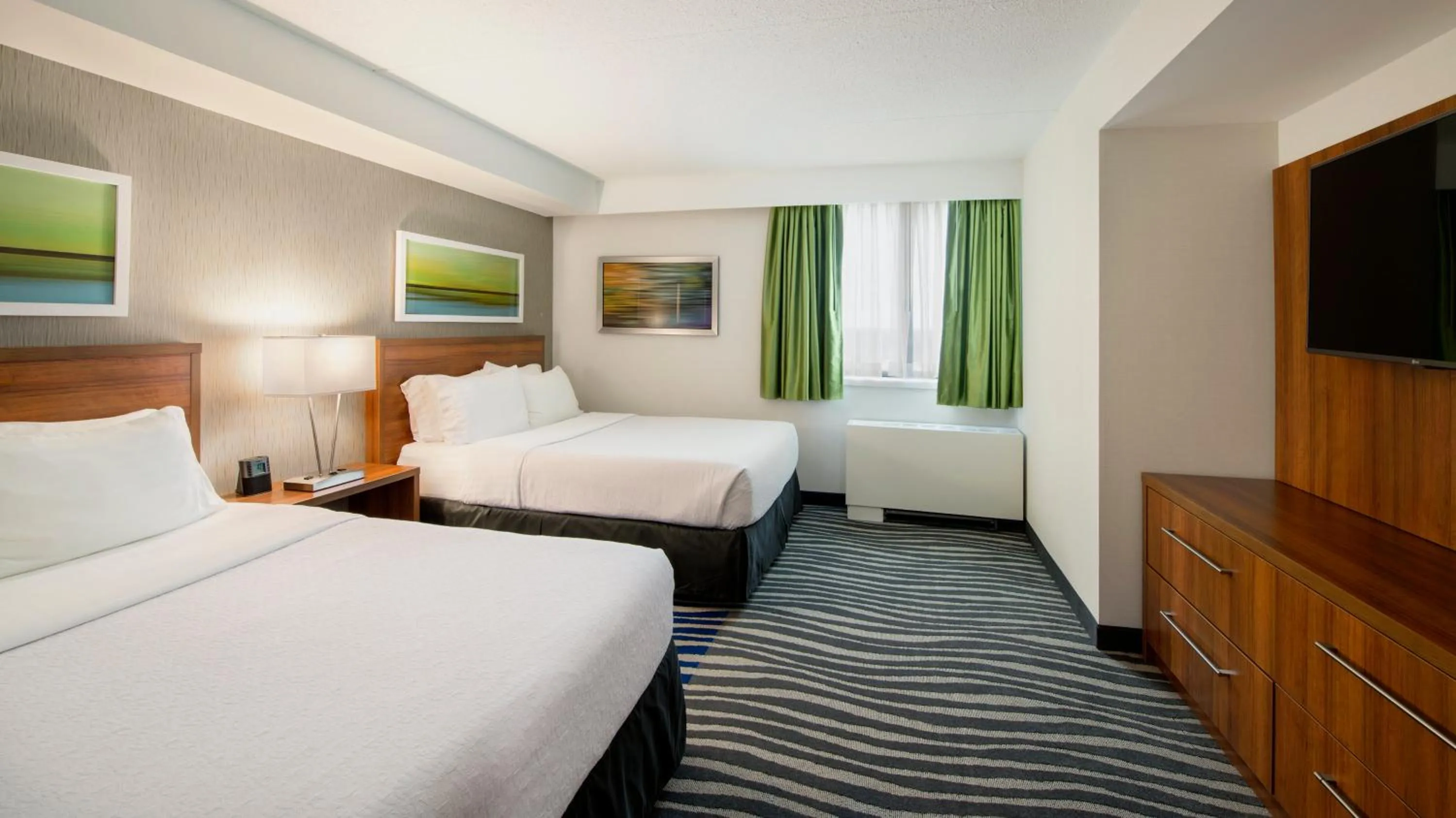 Photo of the whole room, Bed in Holiday Inn Winnipeg - Airport West, an IHG Hotel