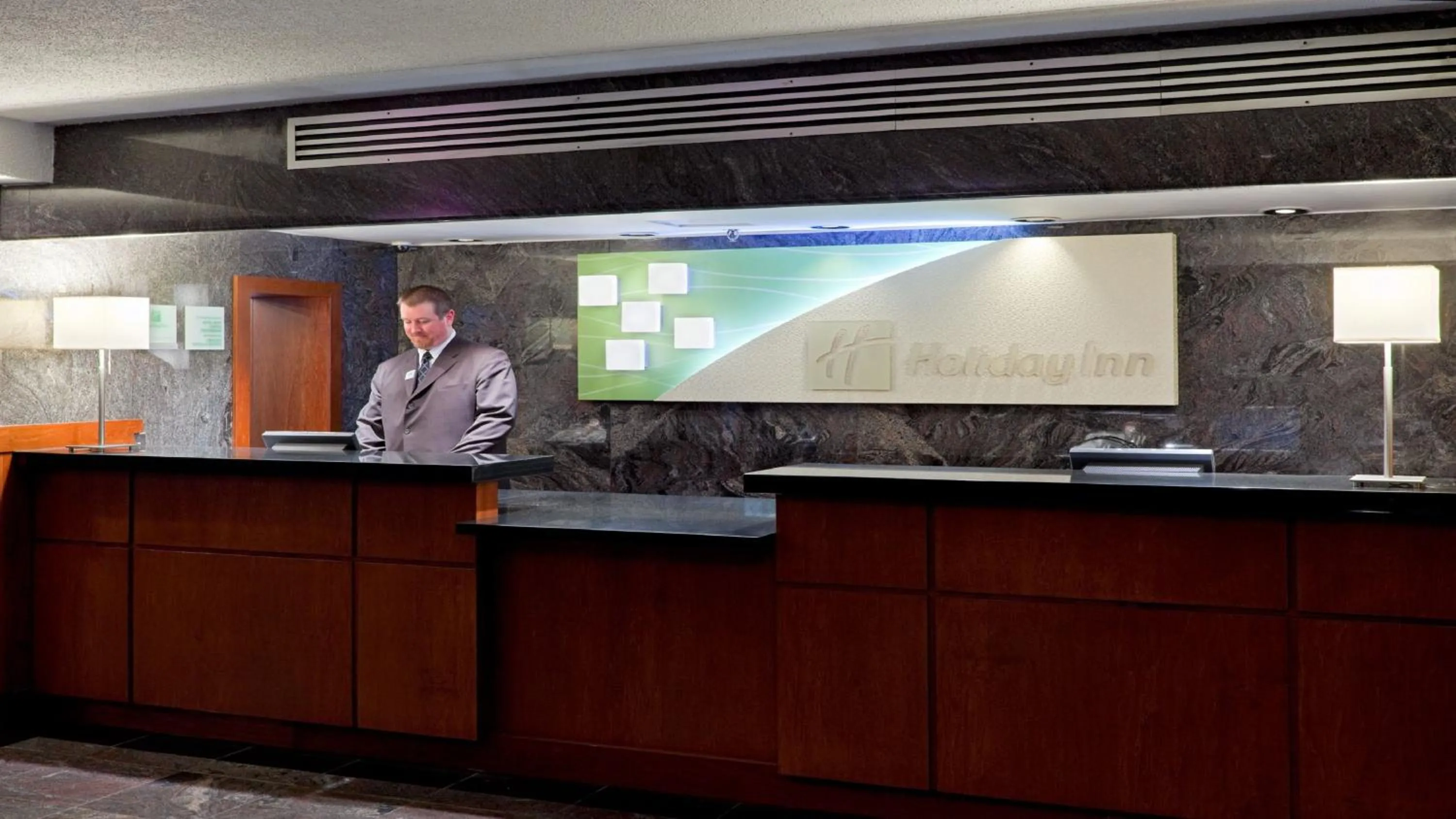 Lobby or reception in Holiday Inn Oakville Centre by IHG