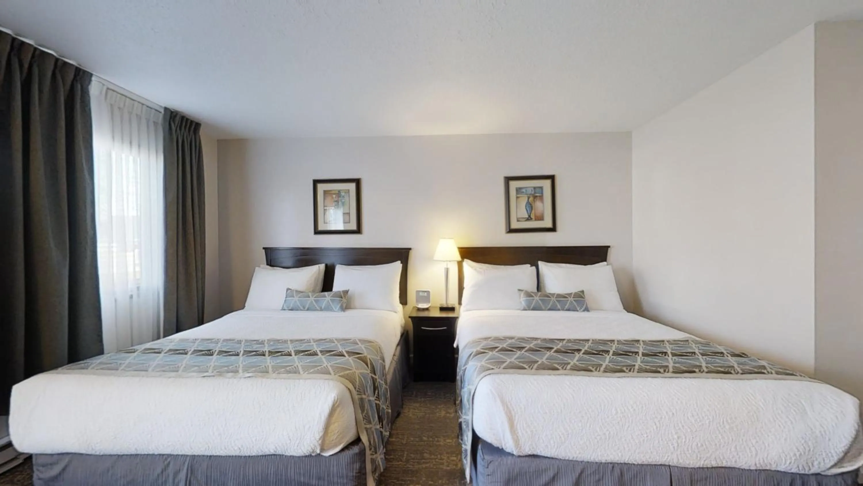 Bed in Dilworth Inn Kelowna