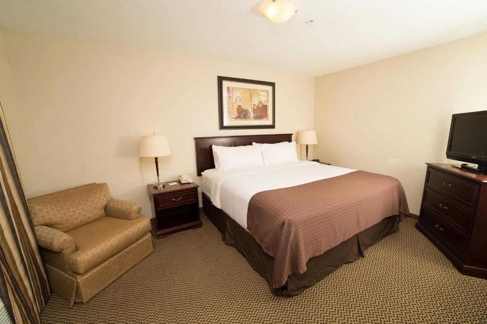 Photo of the whole room, Bed in Holiday Inn & Suites Lloydminster by IHG