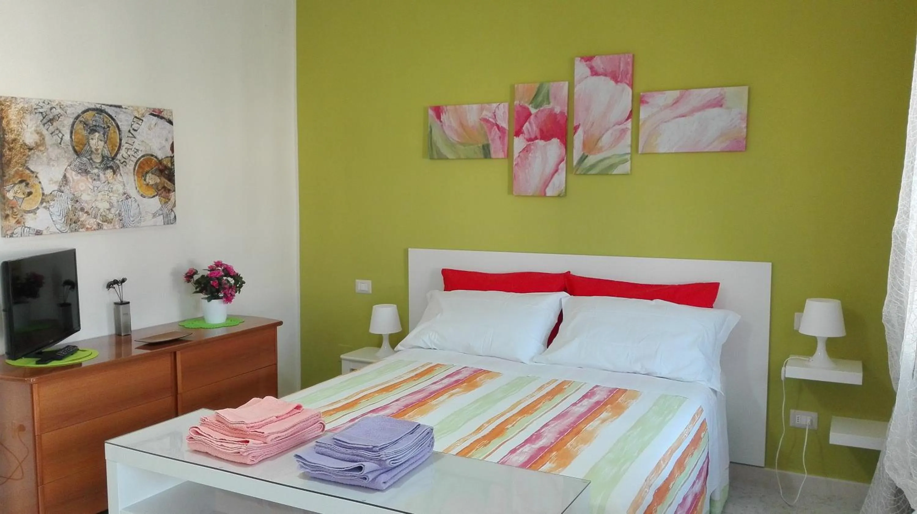 Photo of the whole room, Bed in Il Tulipano
