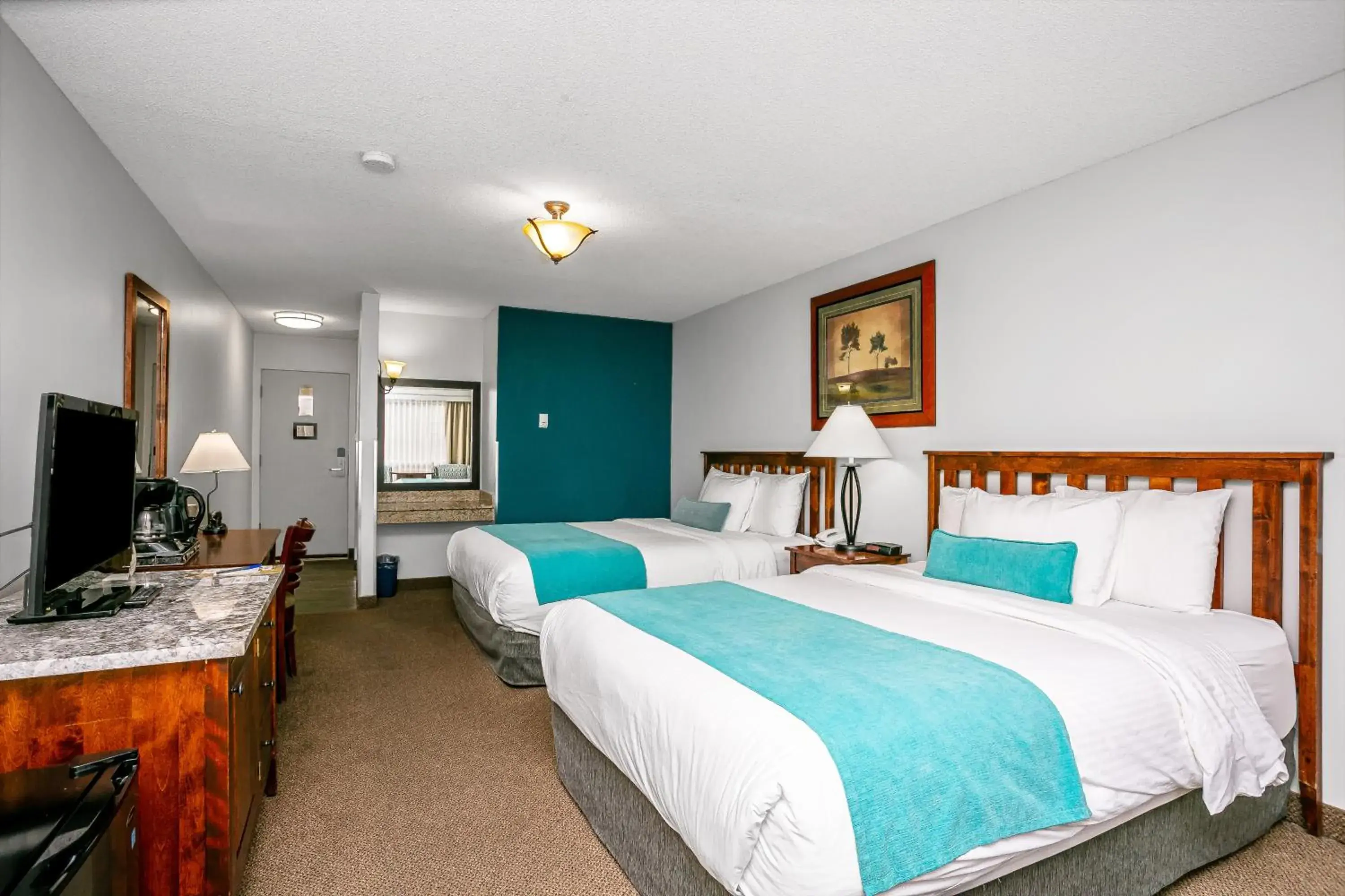 Bed in Tonquin Inn Bed in Tonquin Inn