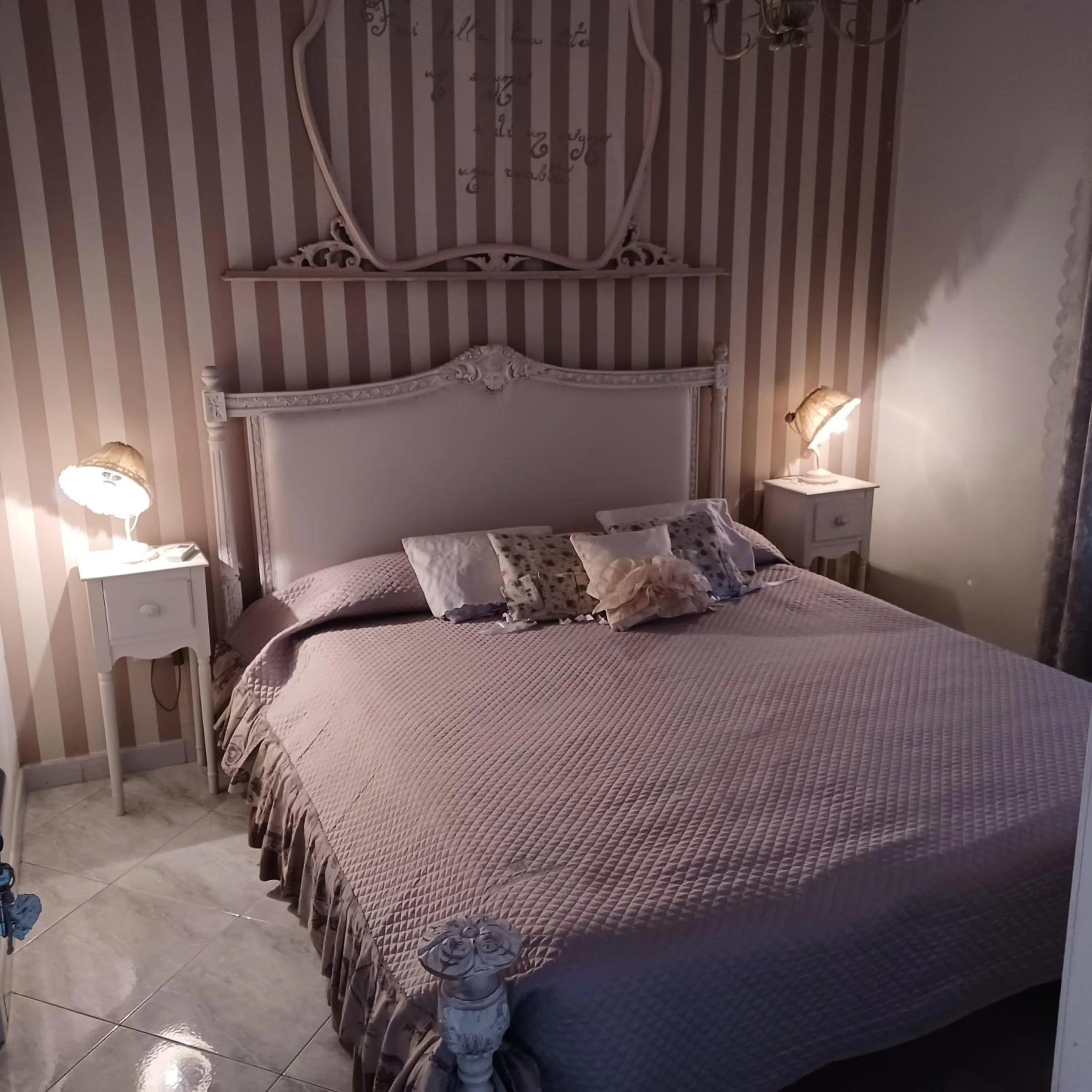 Photo of the whole room, Bed in La Corte delle Vanità