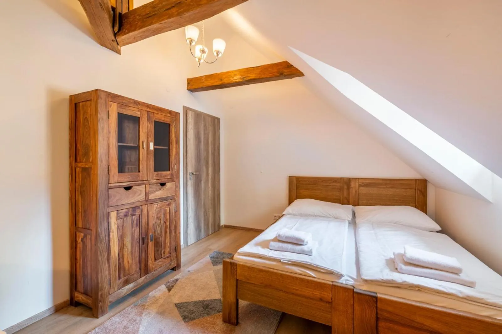 Bed in Old Town Square Apartments