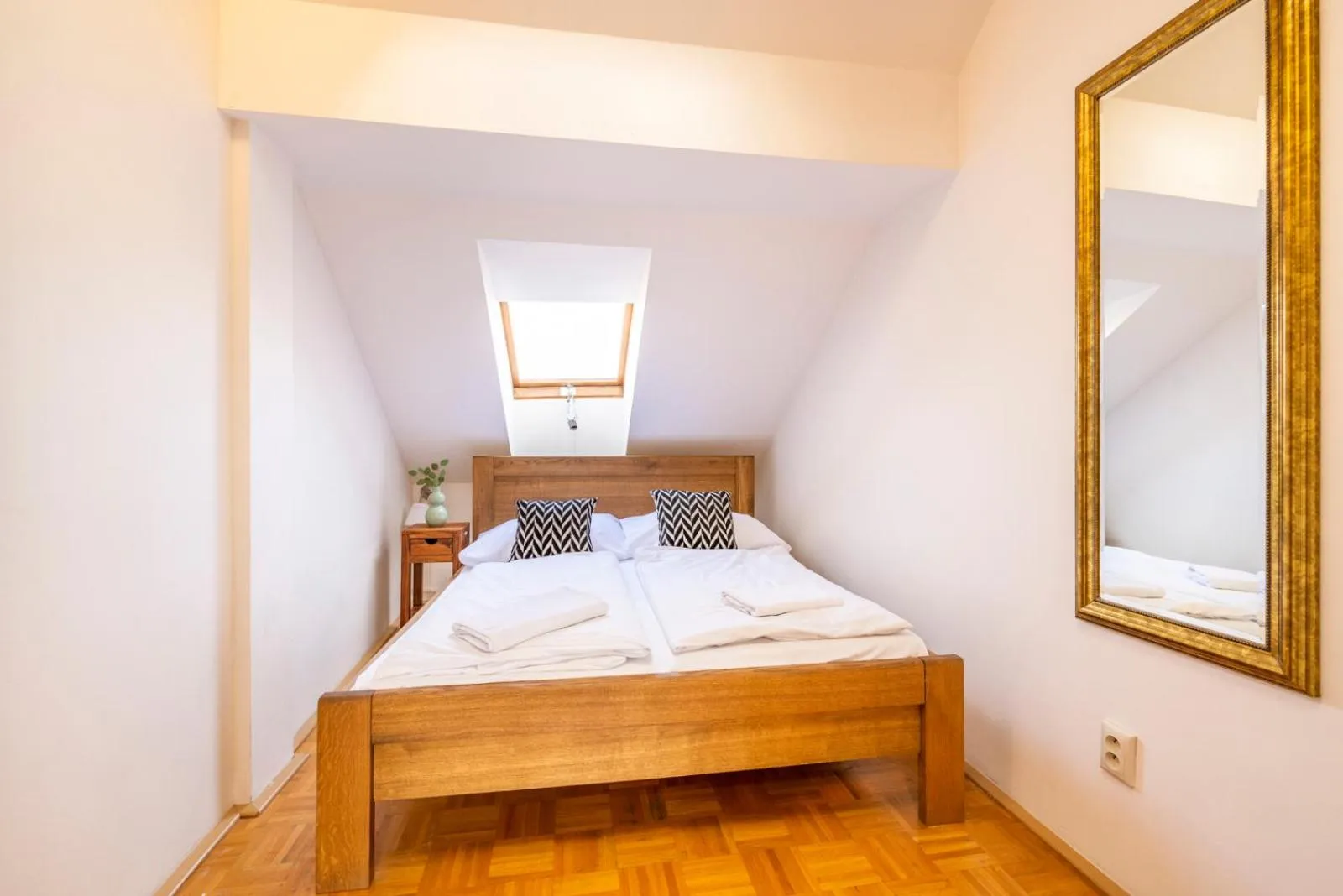 Bed in Old Town Square Apartments