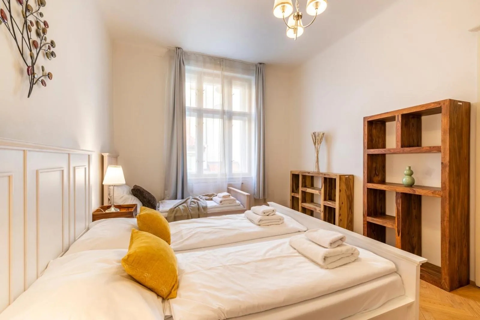 Bed in Old Town Square Apartments