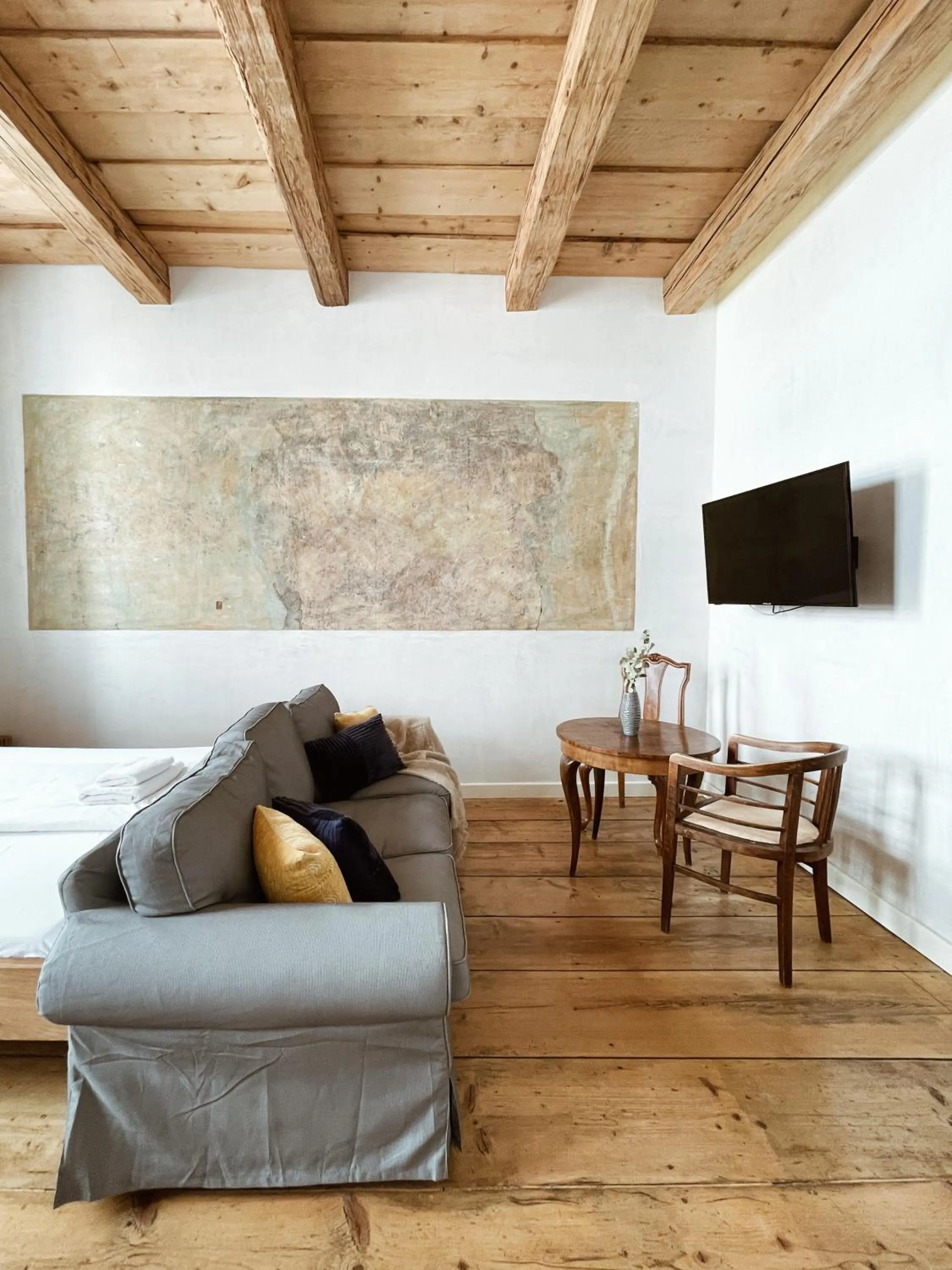 Bed in Old Town Square Apartments