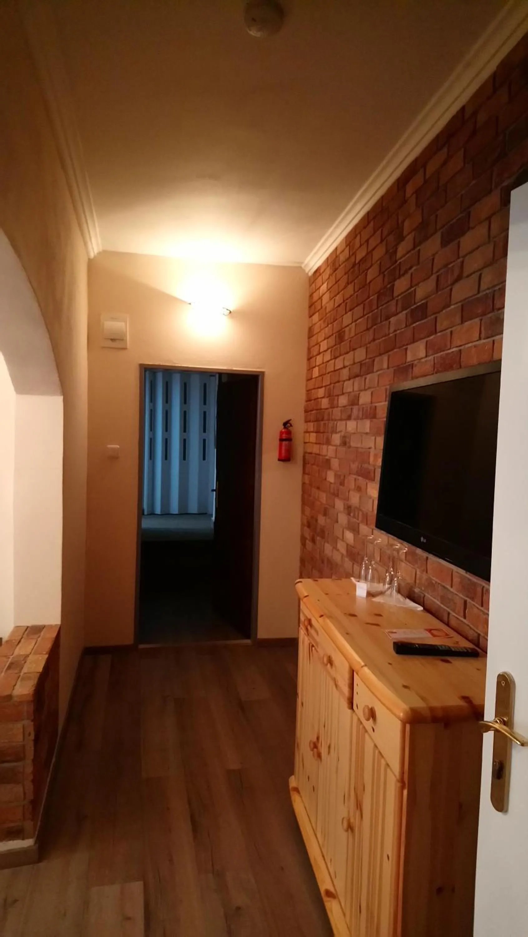 Communal lounge/ TV room in Enjoy Inn