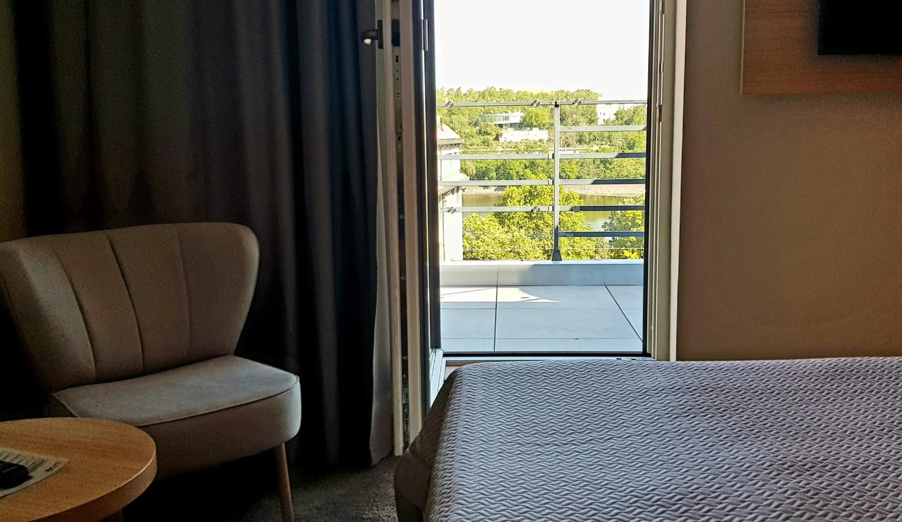 Seating area, Bed in Hotel Clement