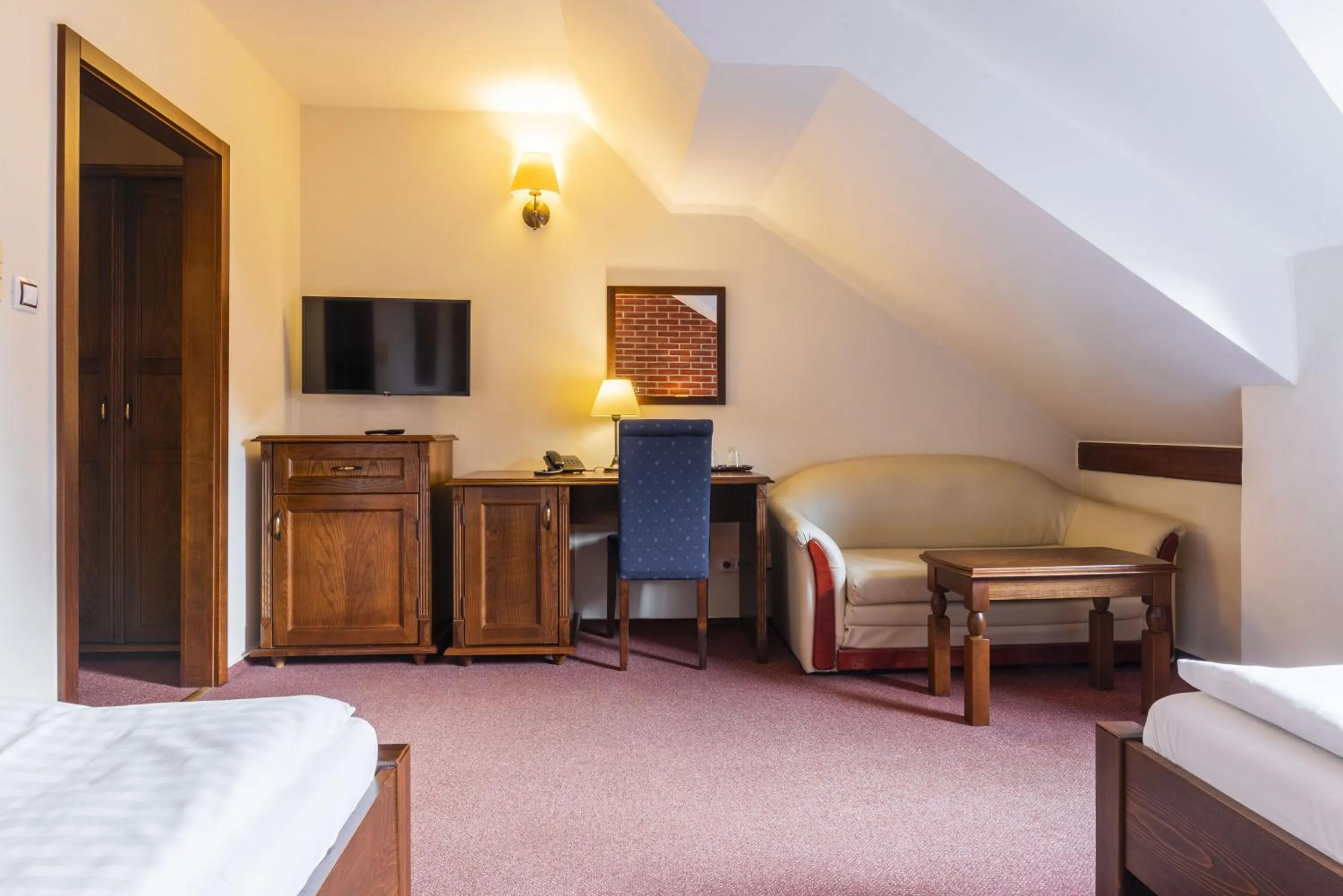 Living room, Bed in Wellness Hotel Gondola