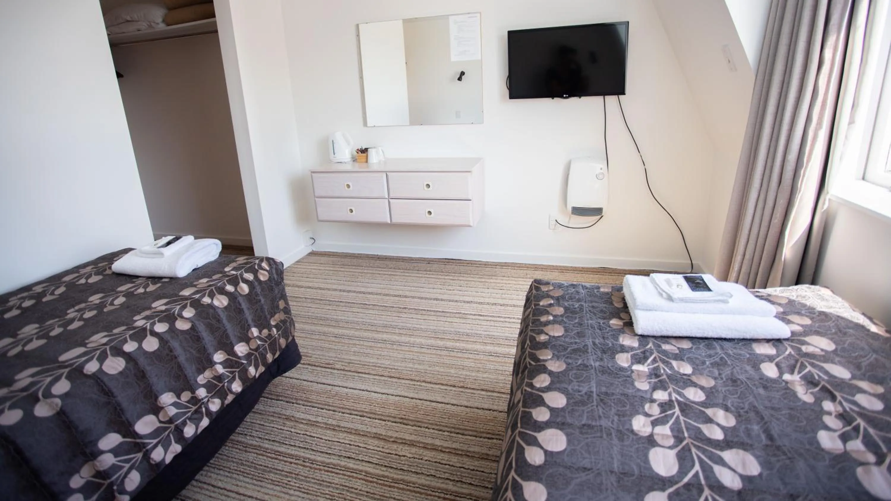 Bed in Southern Cross Lodge Methven