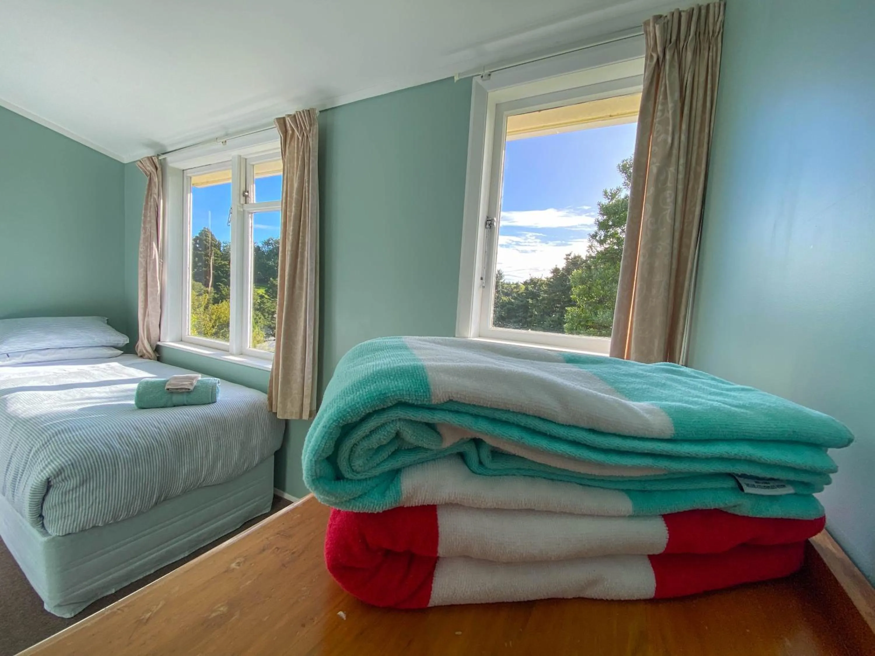 towels, Bed in Kauri Villas