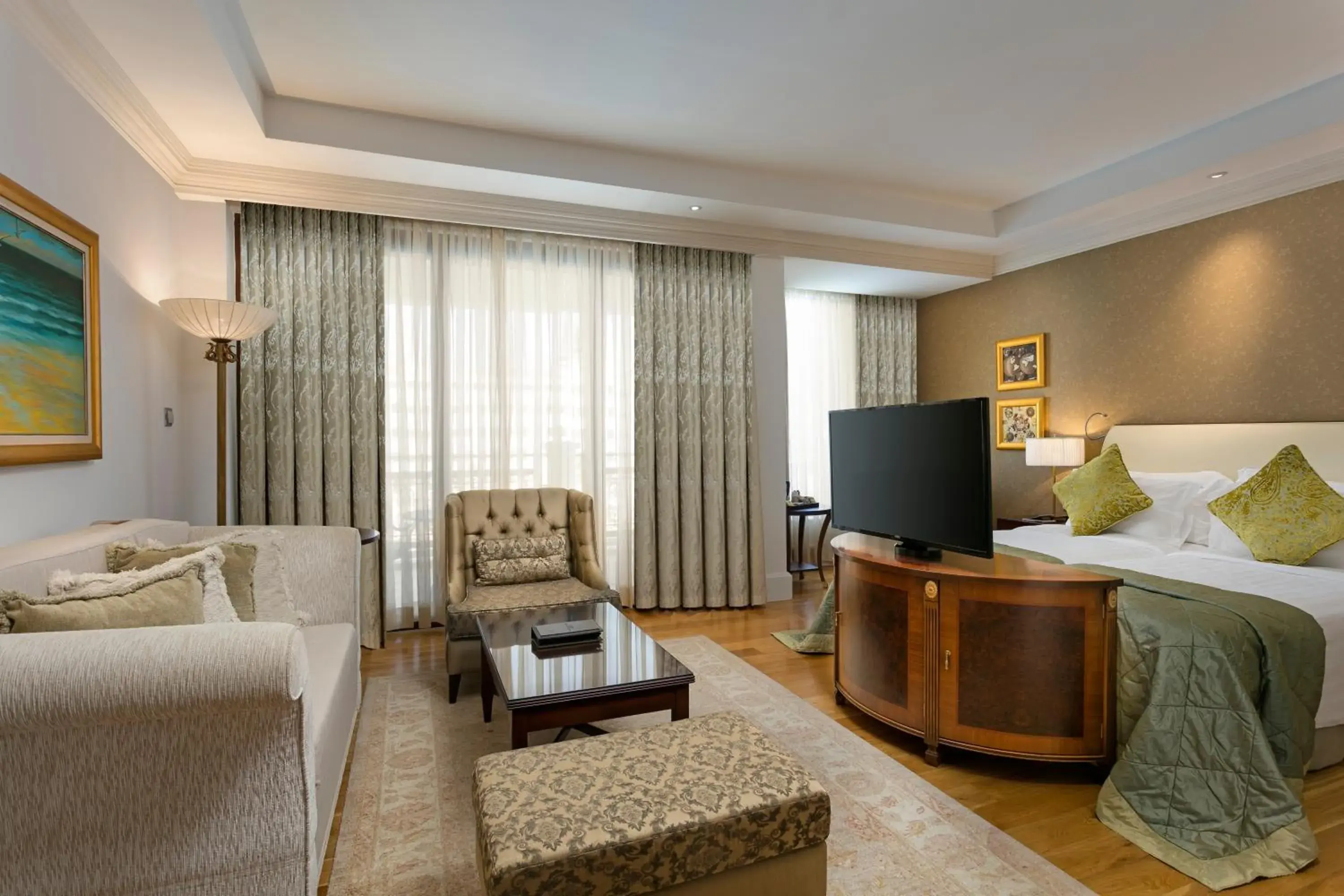 Seating area, Bed in Titanic Mardan Palace Seating area, Bed in Titanic Mardan Palace