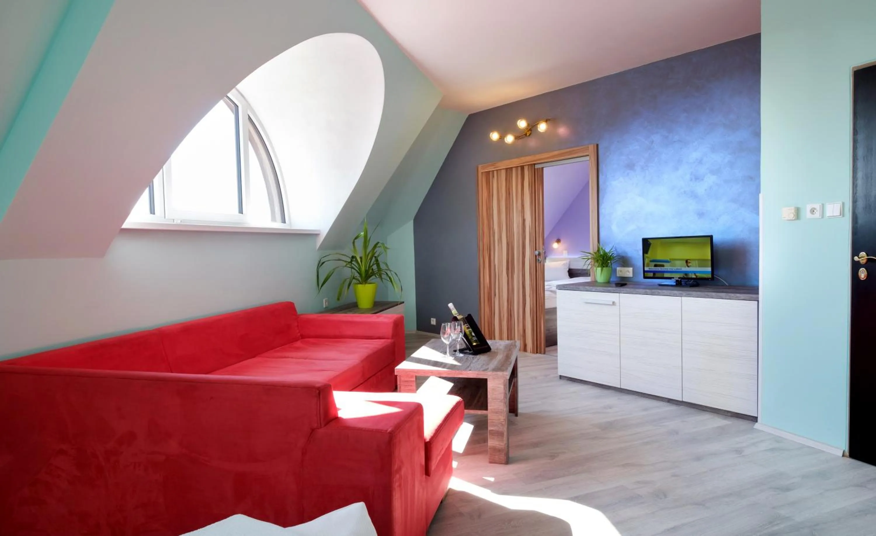 Living room, Bed in Hotel N