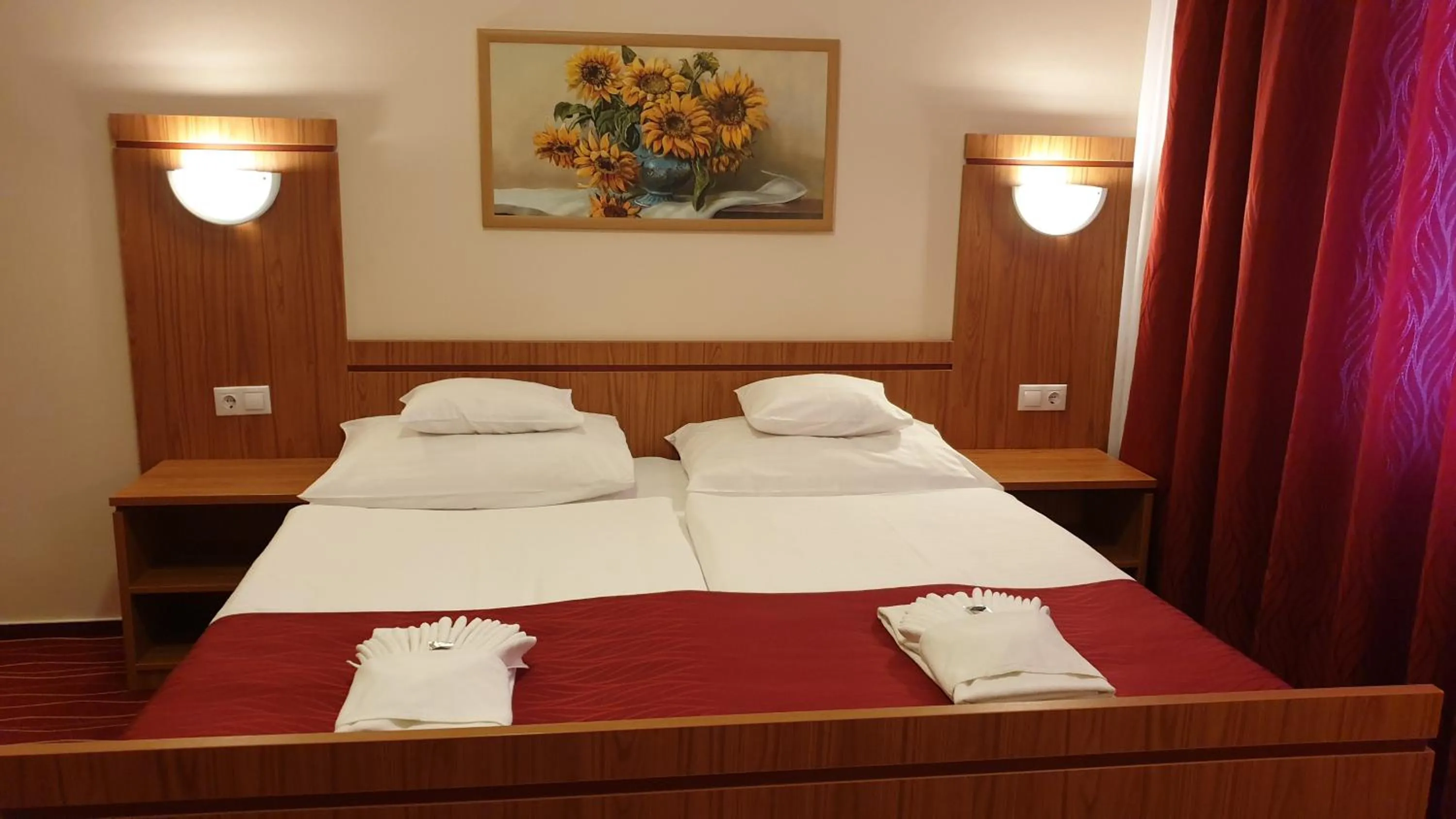 Bed in Diana Club Hotel