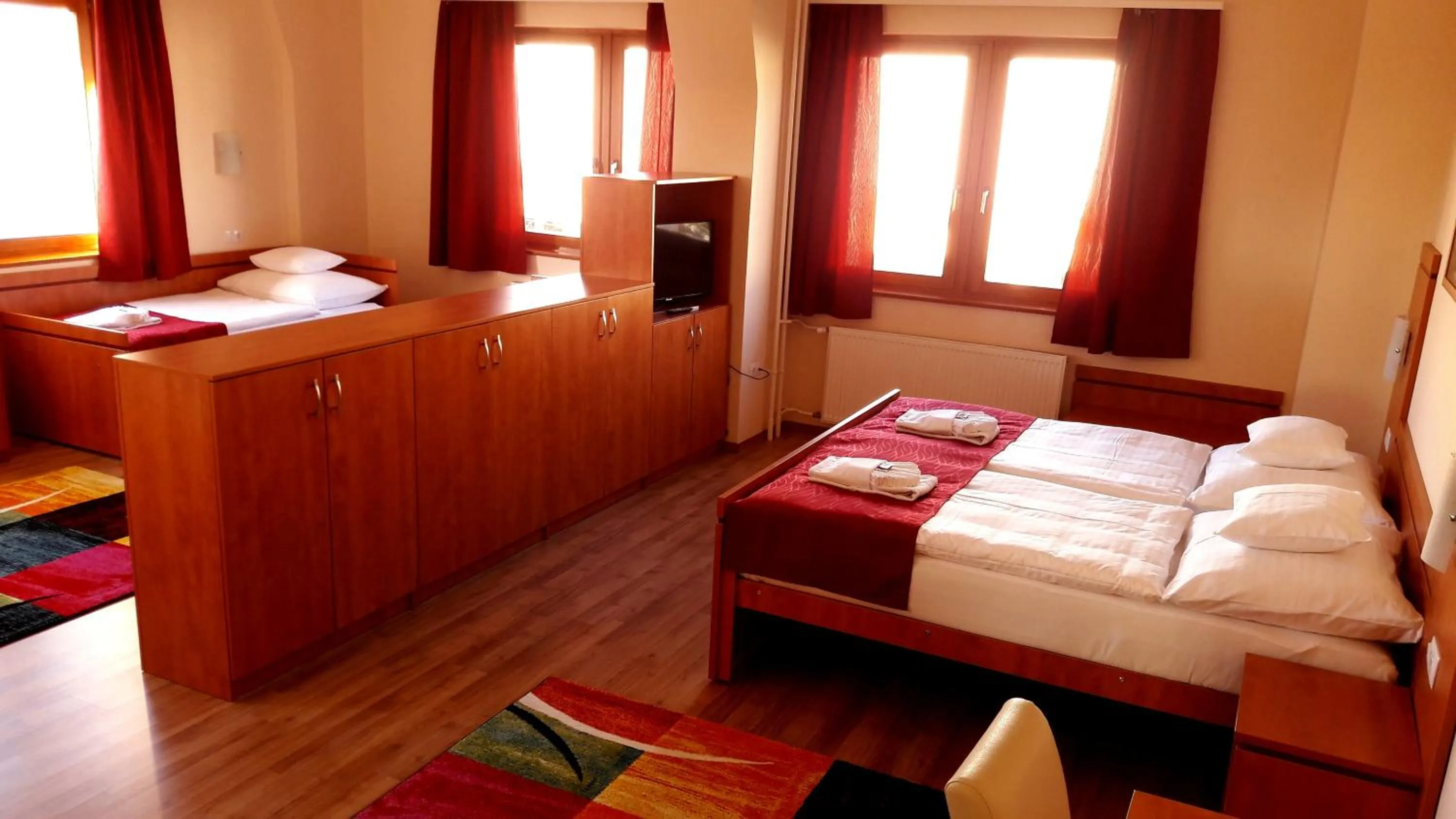 Bed in Diana Club Hotel