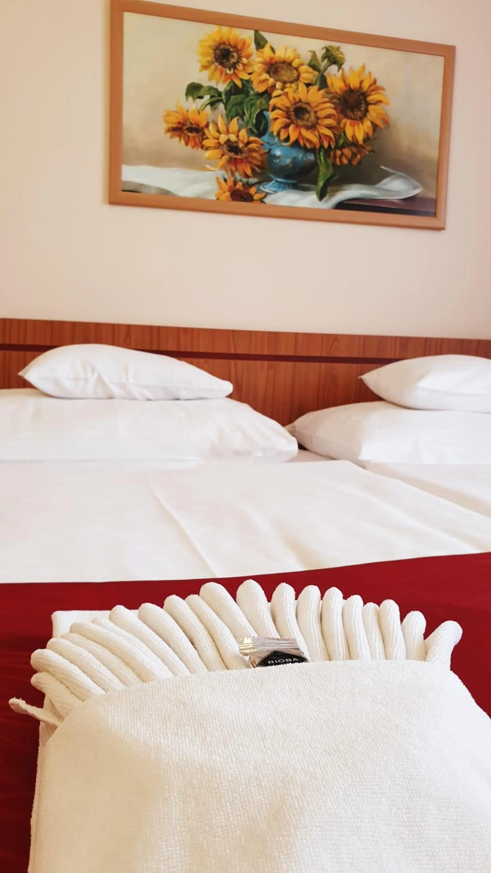 Bed in Diana Club Hotel