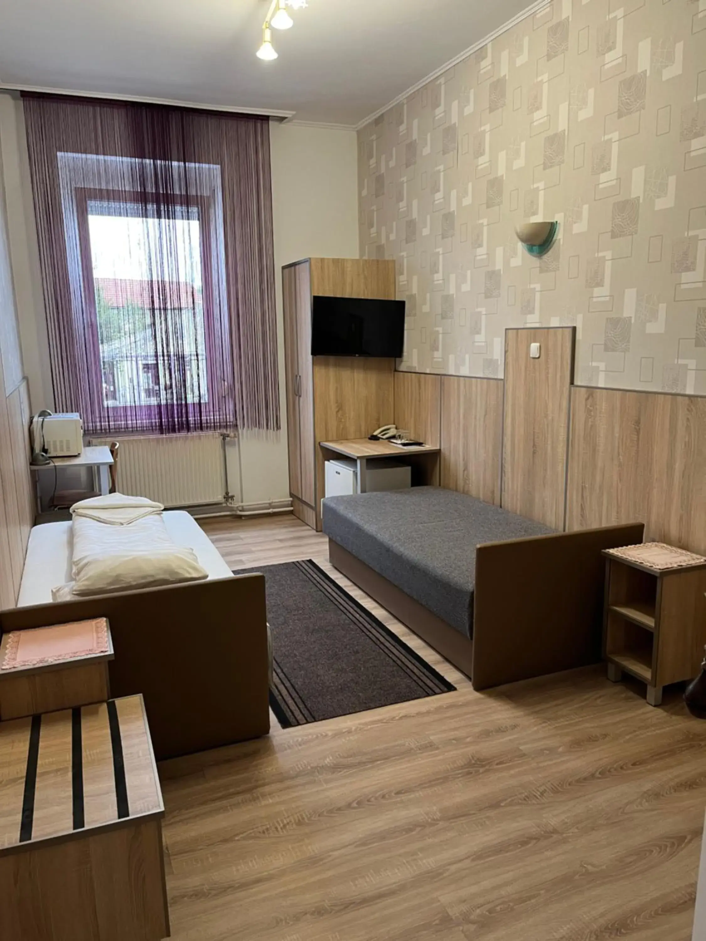Twin Room with Bathroom in Korona Vendégház Twin Room with Bathroom in Korona Vendégház