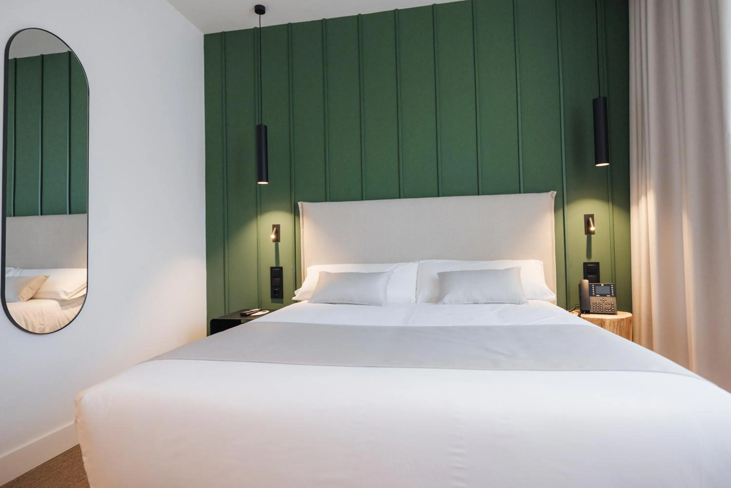 Bed in Mondragon Hotela