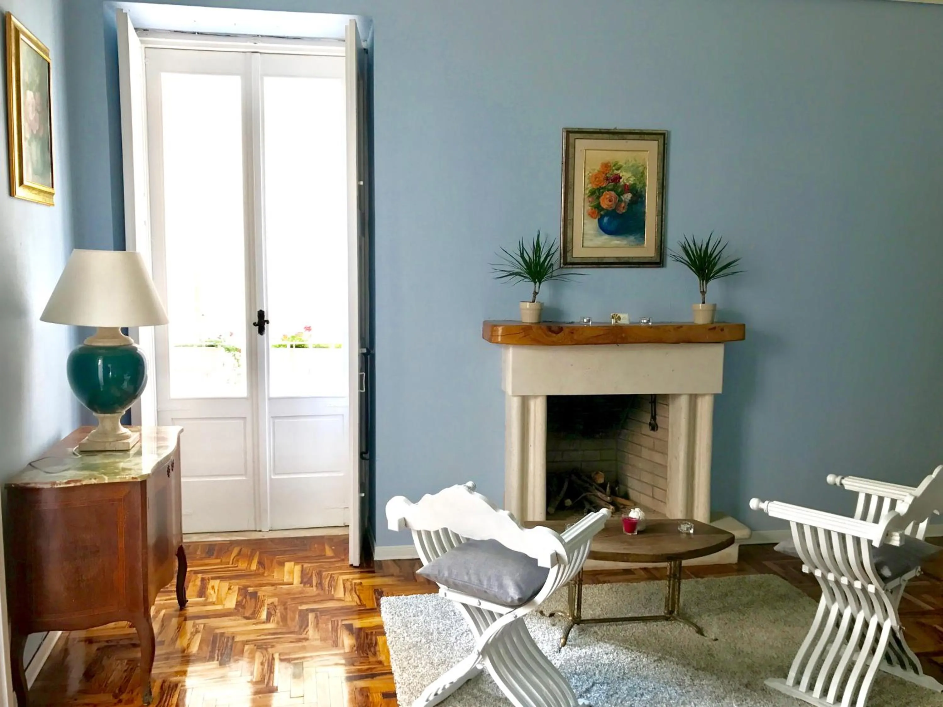 Communal lounge/ TV room in B&B Palazzo Giorgi