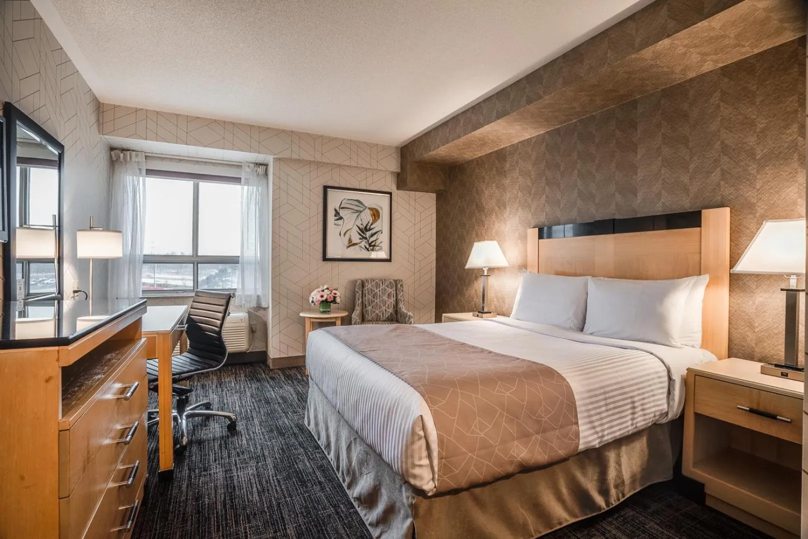 Photo of the whole room, Bed in Monte Carlo Inn Barrie - Newly Renovated